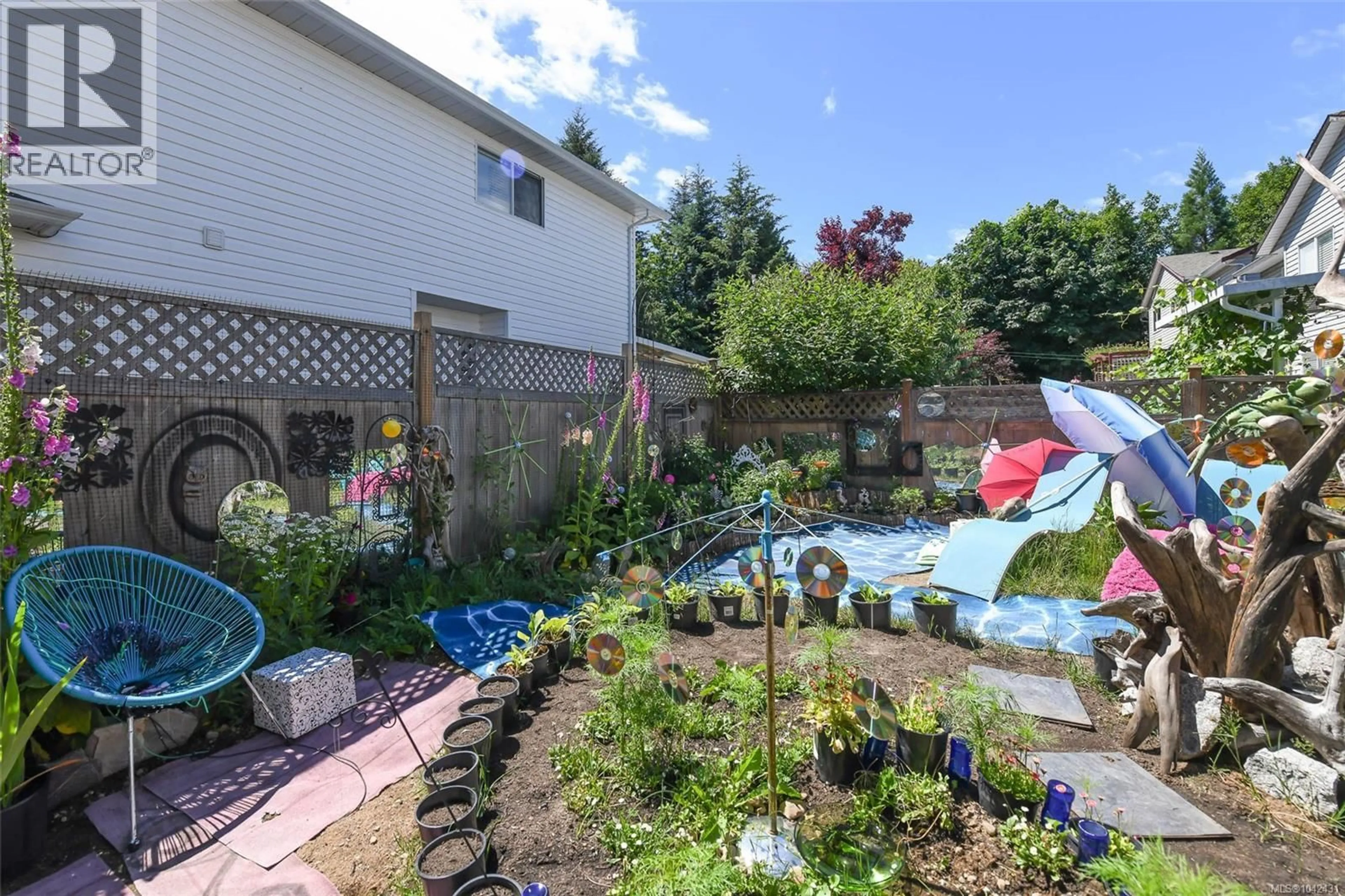 A pic from outside/outdoor area/front of a property/back of a property/a pic from drone, street for B - 2256 1ST STREET, Courtenay British Columbia V9N8X8