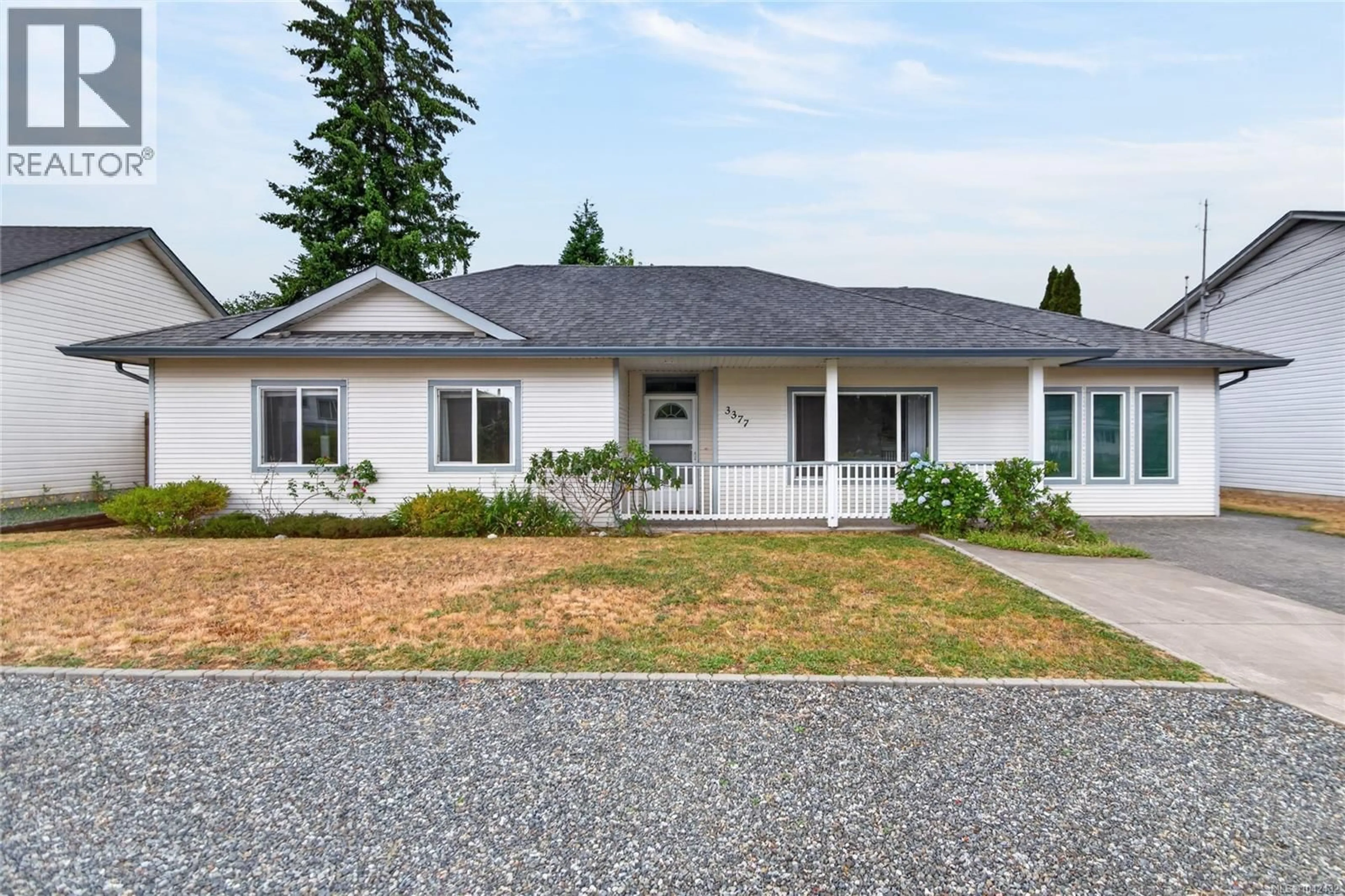 Home with vinyl exterior material, street for 3377 PRIMROSE STREET, Cumberland British Columbia V0R1S0
