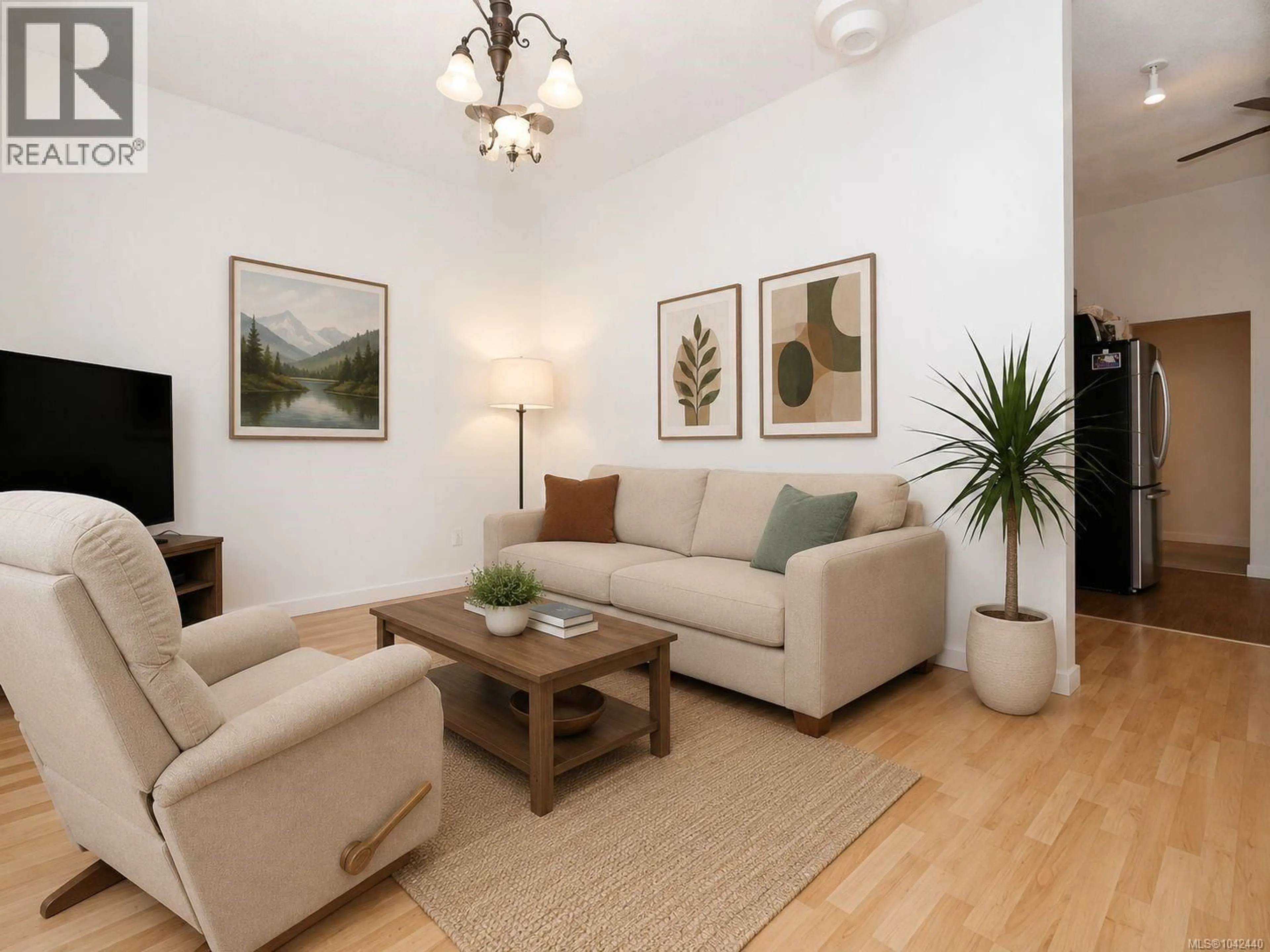 Living room with furniture, wood/laminate floor for 221 SKINNER STREET, Victoria British Columbia V9A3B2