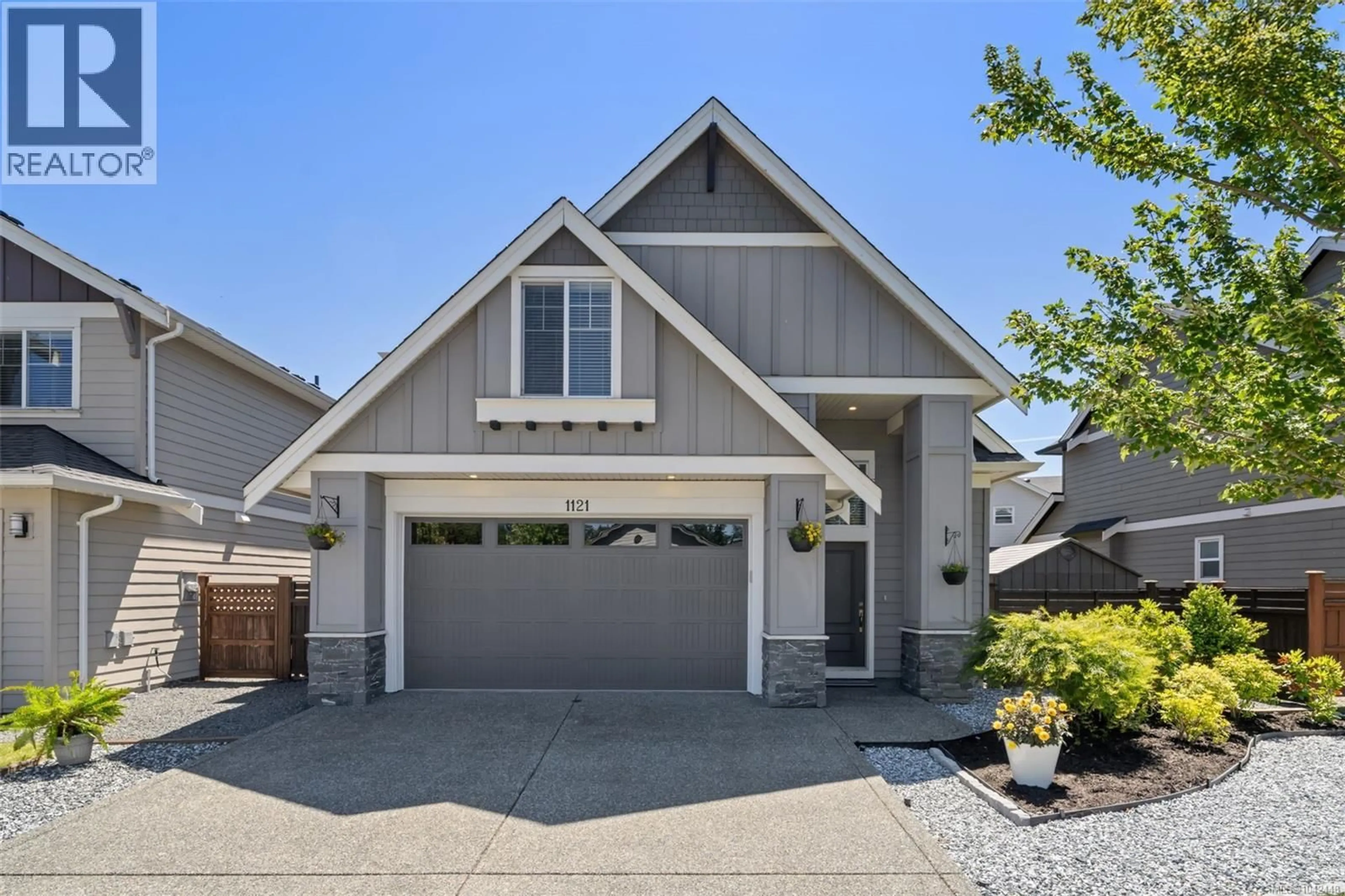 Home with vinyl exterior material, street for 1121 SMOKEHOUSE CRESCENT, Langford British Columbia V9C0M6