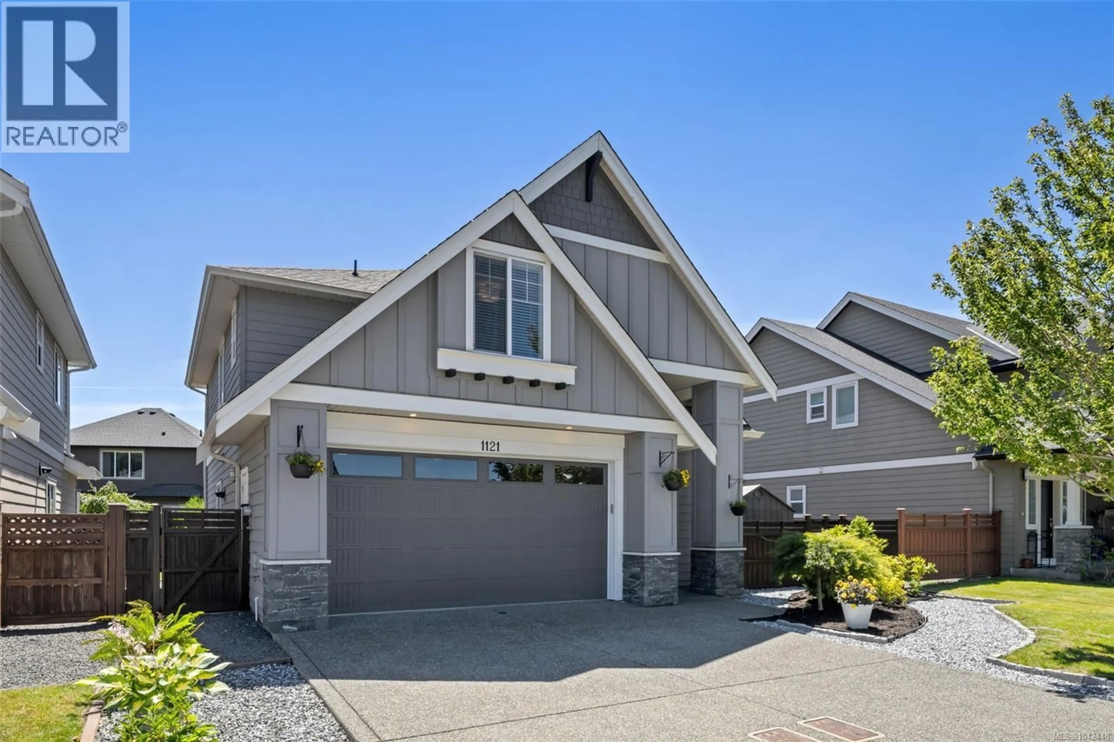 Home with vinyl exterior material, street for 1121 SMOKEHOUSE CRESCENT, Langford British Columbia V9C0M6