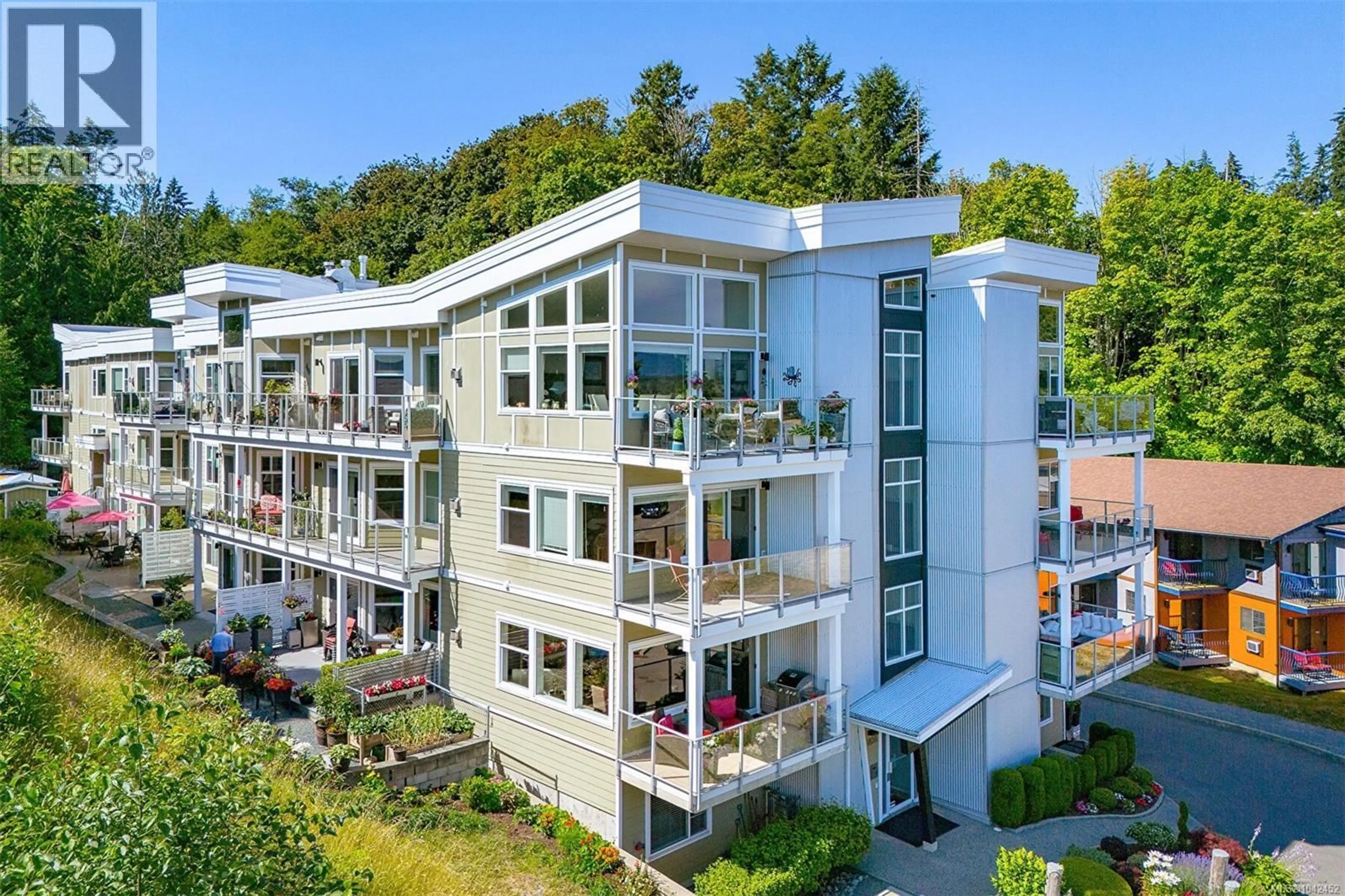 A pic from outside/outdoor area/front of a property/back of a property/a pic from drone, building for 101 - 1838 COWICHAN BAY ROAD, Cowichan Bay British Columbia V0R1N1