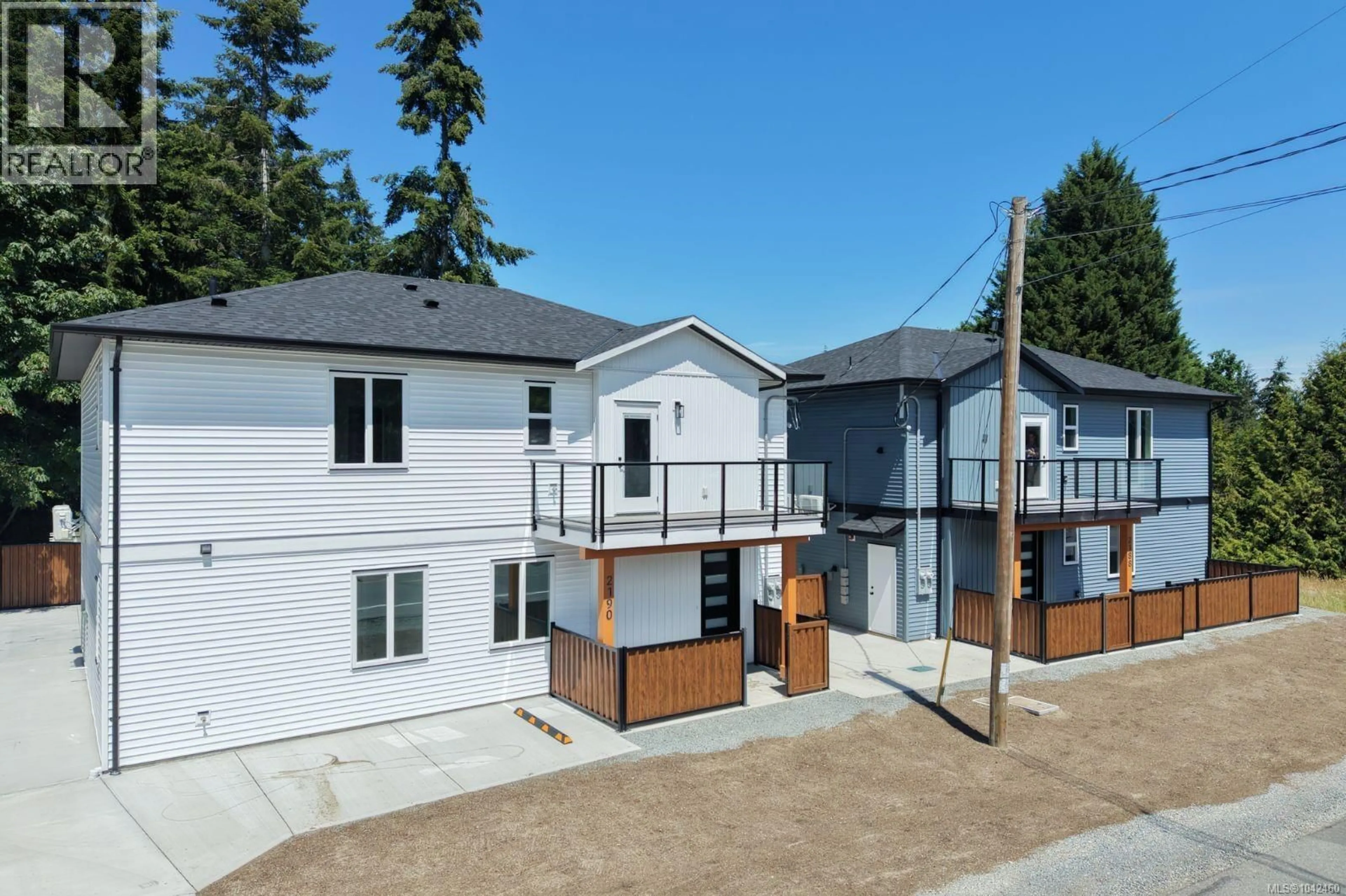A pic from outside/outdoor area/front of a property/back of a property/a pic from drone, street for 100 - 2190 JINGLE POT ROAD, Nanaimo British Columbia V9R6J2