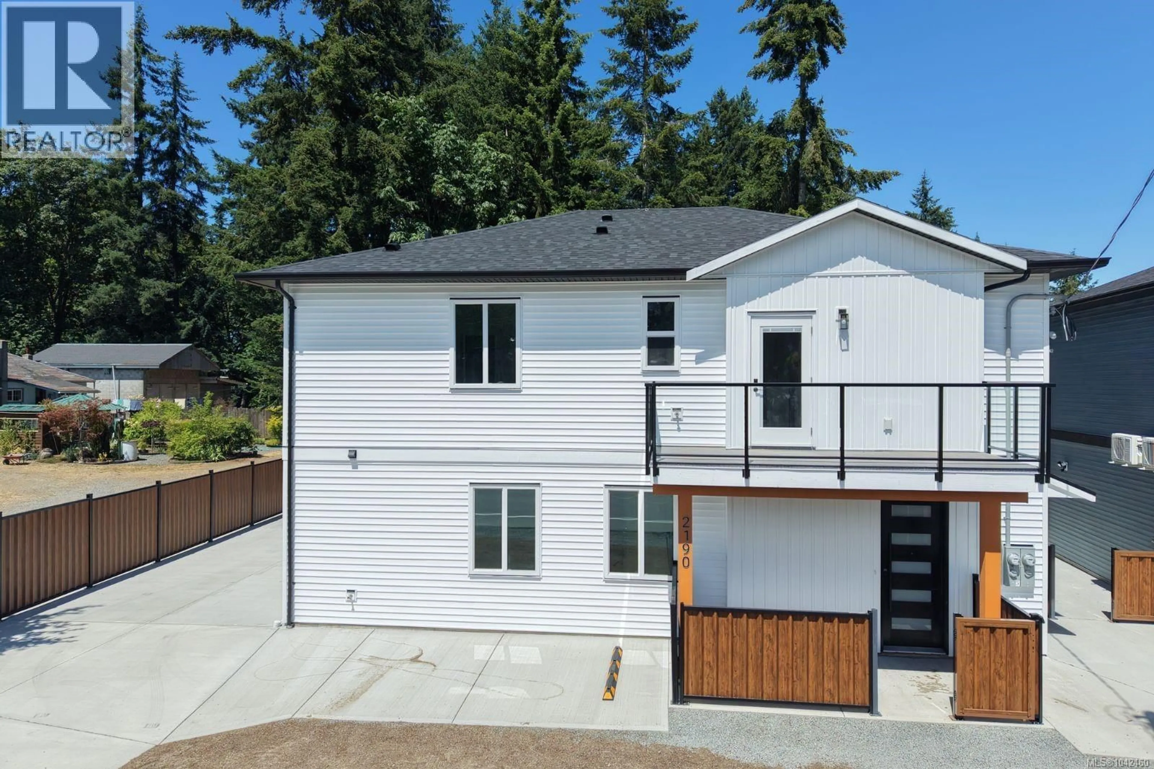 Home with vinyl exterior material, street for 100 - 2190 JINGLE POT ROAD, Nanaimo British Columbia V9R6J2