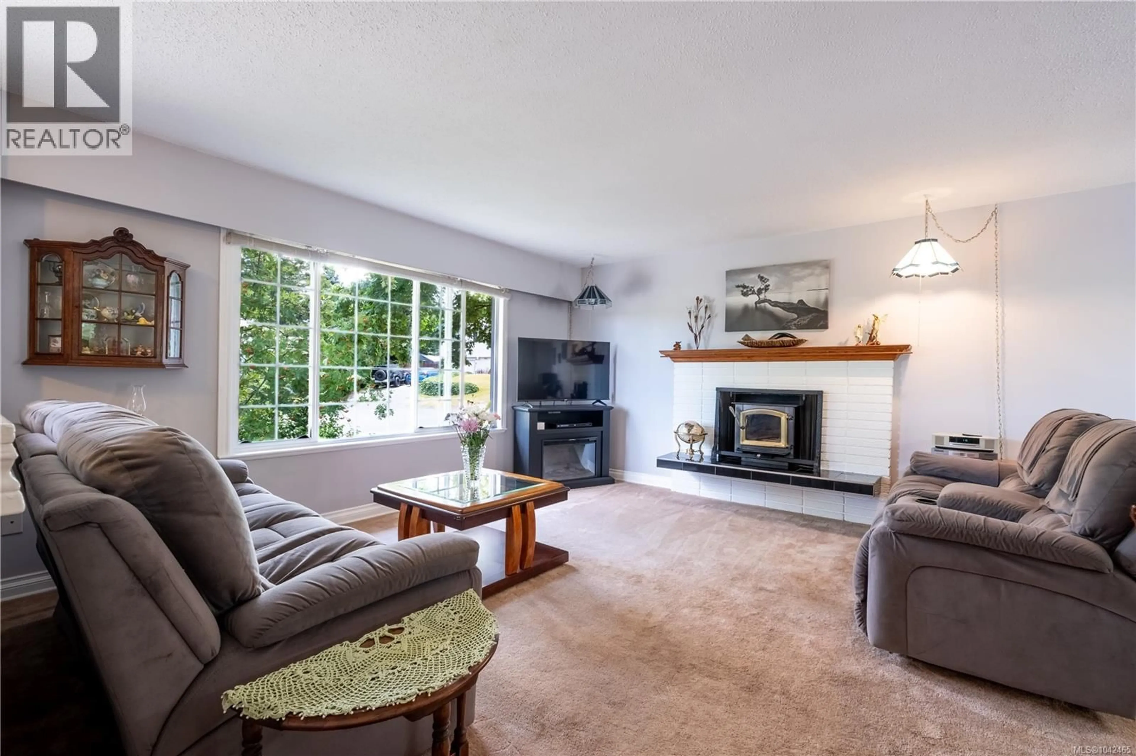Living room with furniture, unknown for 1709 MAHTMOF PLACE, Comox British Columbia V9M2L9