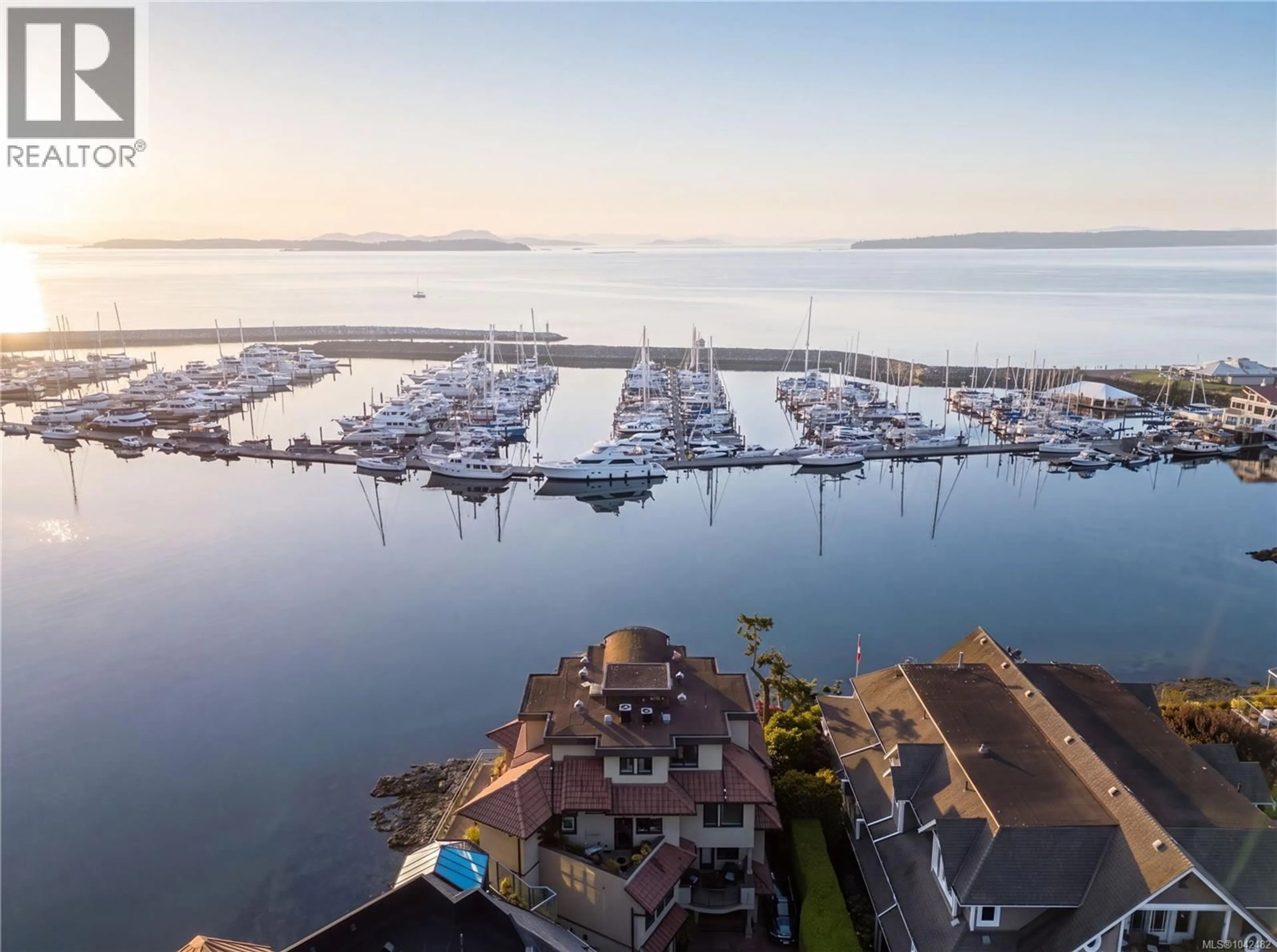 A pic from outside/outdoor area/front of a property/back of a property/a pic from drone, water/lake/river/ocean view for 201 - 9949 THIRD STREET, Sidney British Columbia V8L3B1