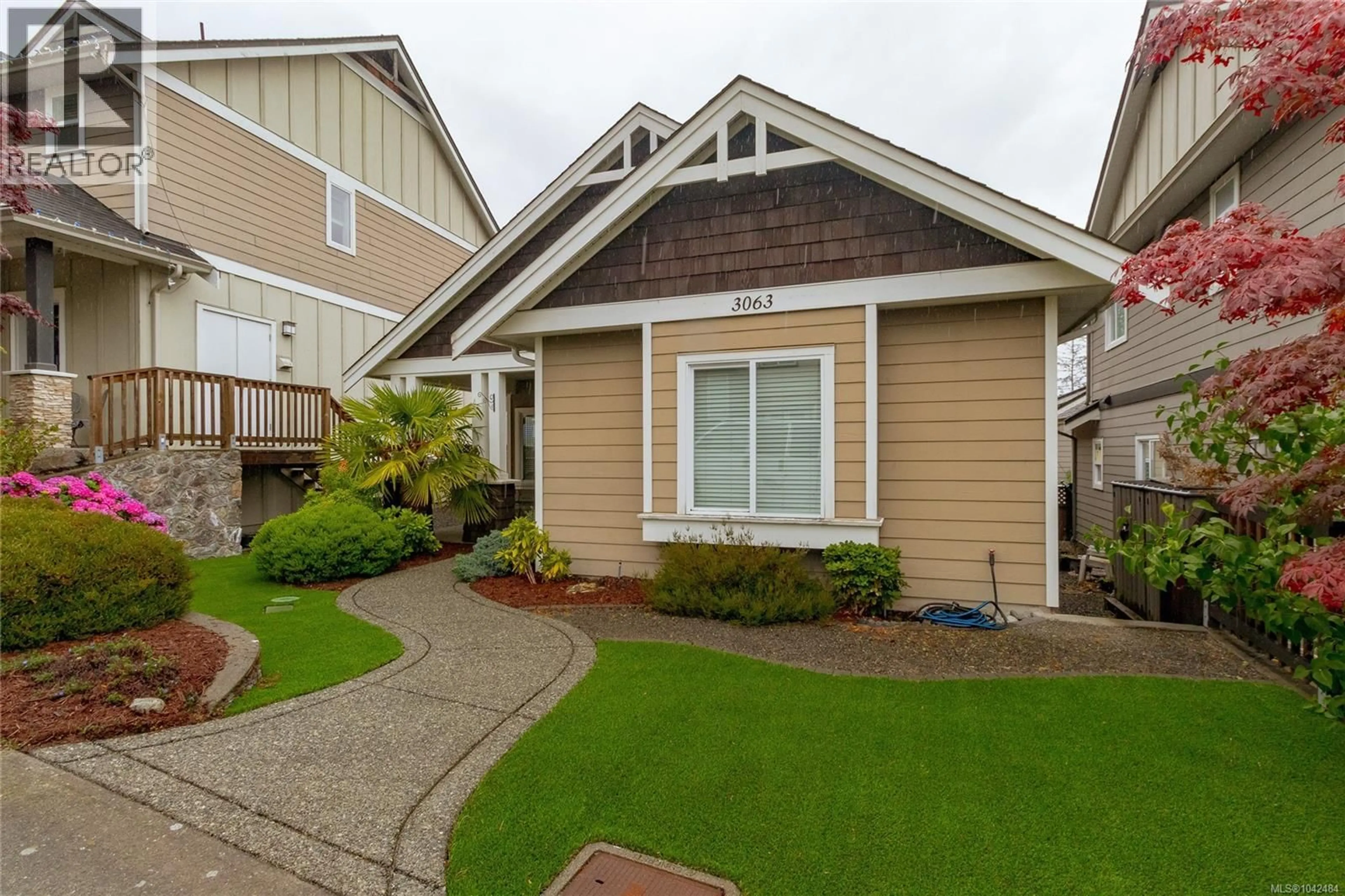 Home with vinyl exterior material, street for 3063 DORNIER ROAD, Langford British Columbia V9B0N2