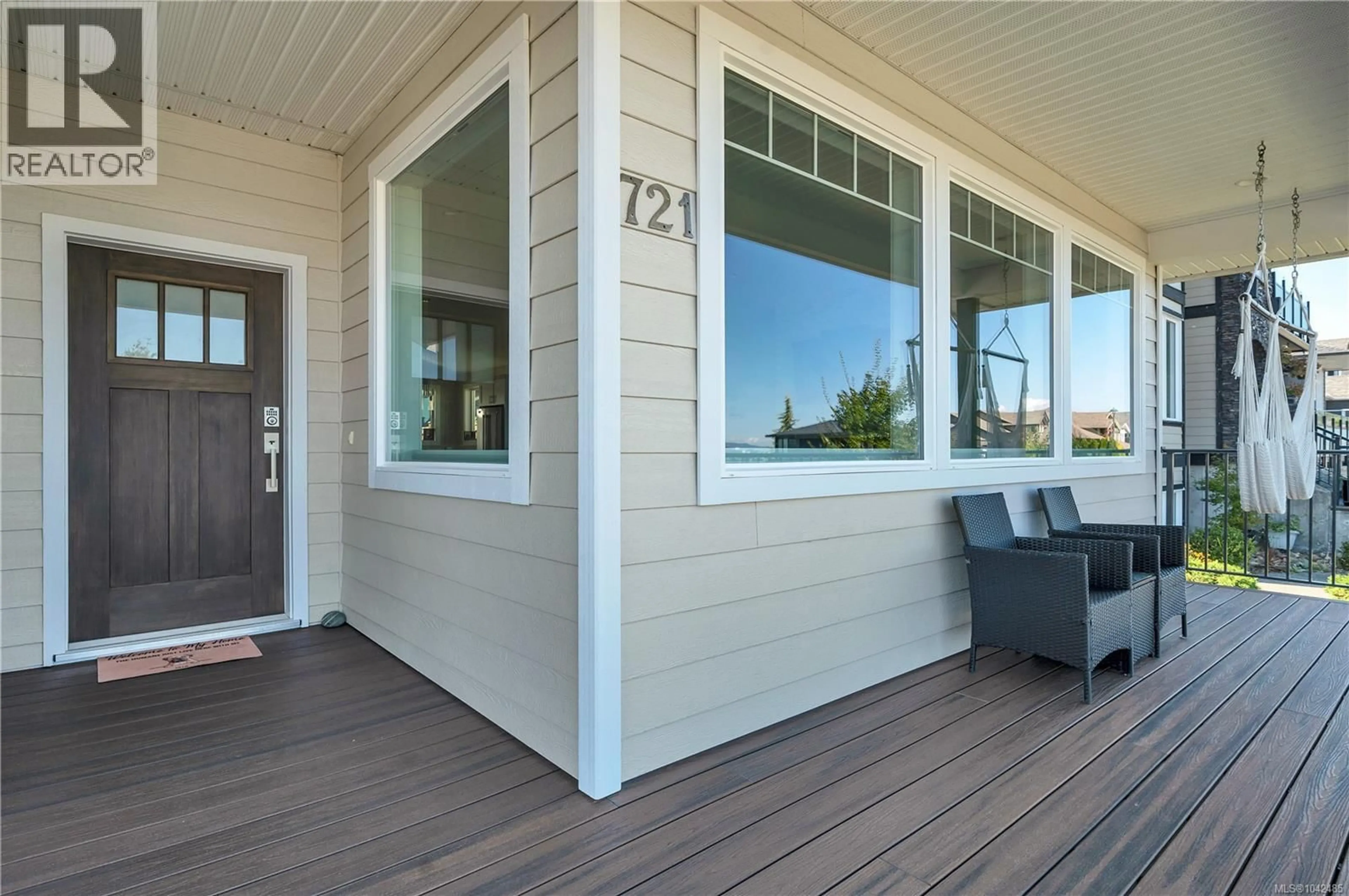 Home with vinyl exterior material, street for 721 TIMBERLINE DRIVE, Campbell River British Columbia V9H0A3