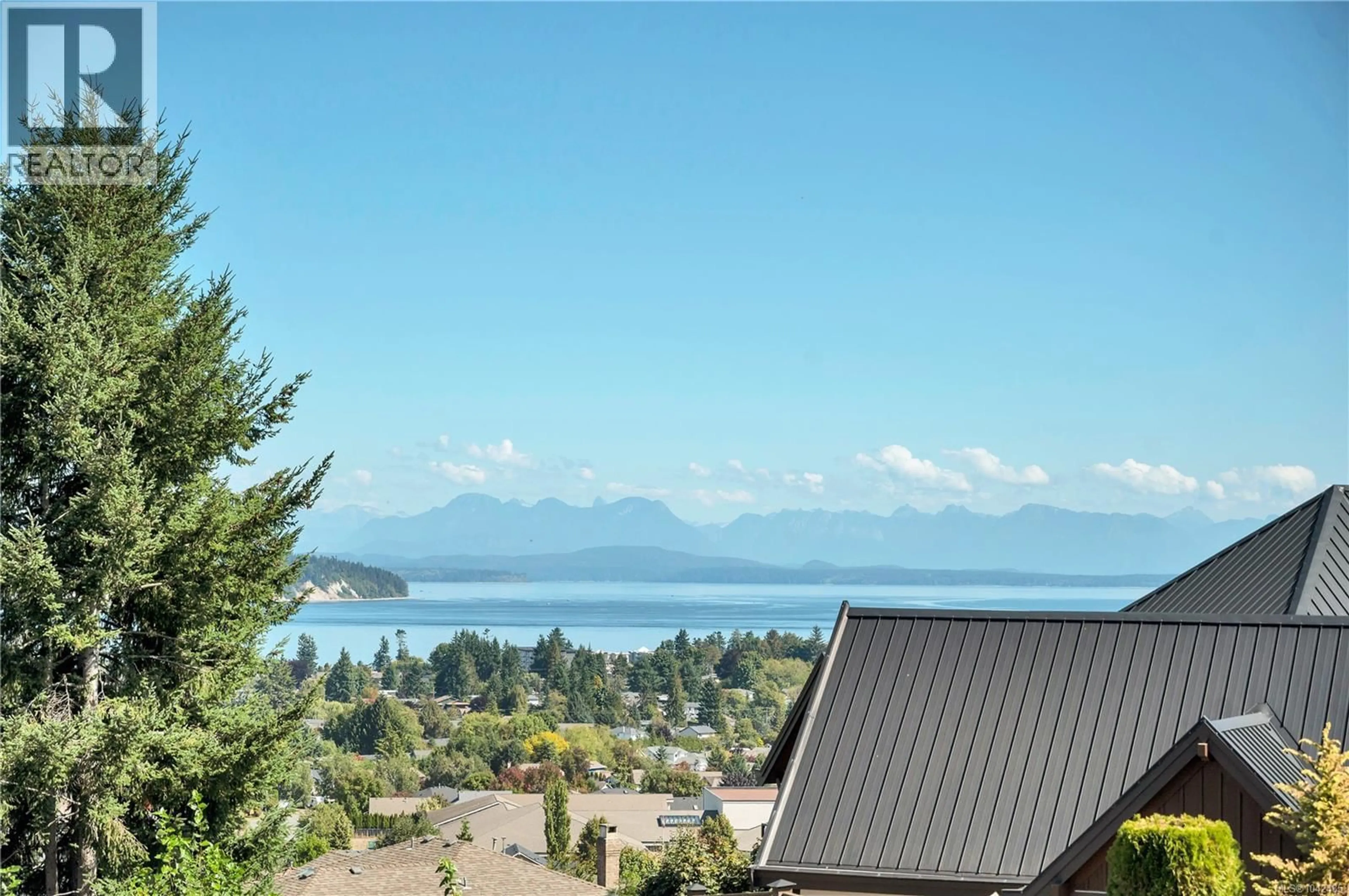 A pic from outside/outdoor area/front of a property/back of a property/a pic from drone, water/lake/river/ocean view for 721 TIMBERLINE DRIVE, Campbell River British Columbia V9H0A3