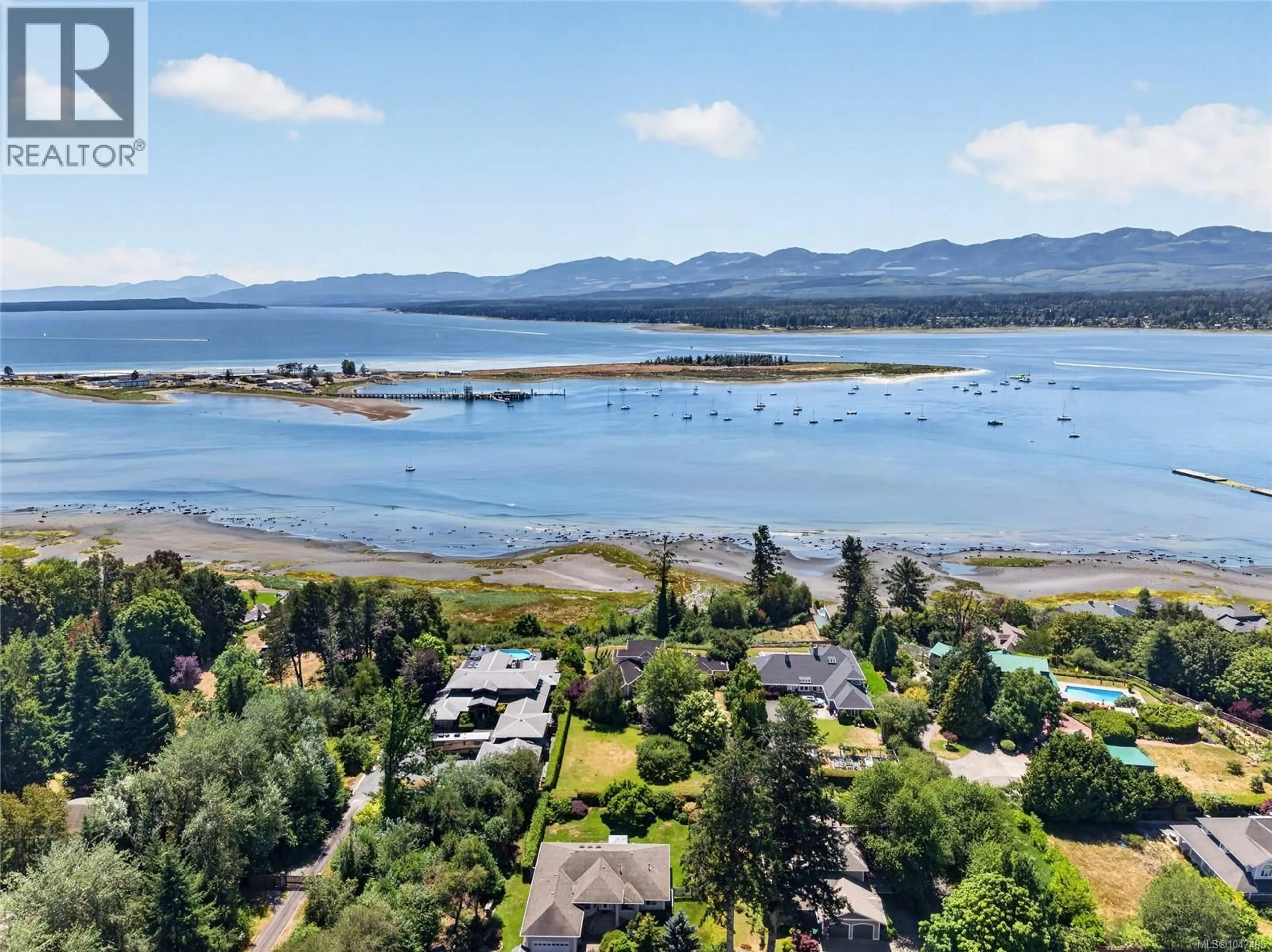 A pic from outside/outdoor area/front of a property/back of a property/a pic from drone, water/lake/river/ocean view for 1627 BEAUFORT AVENUE, Comox British Columbia V9M1R8