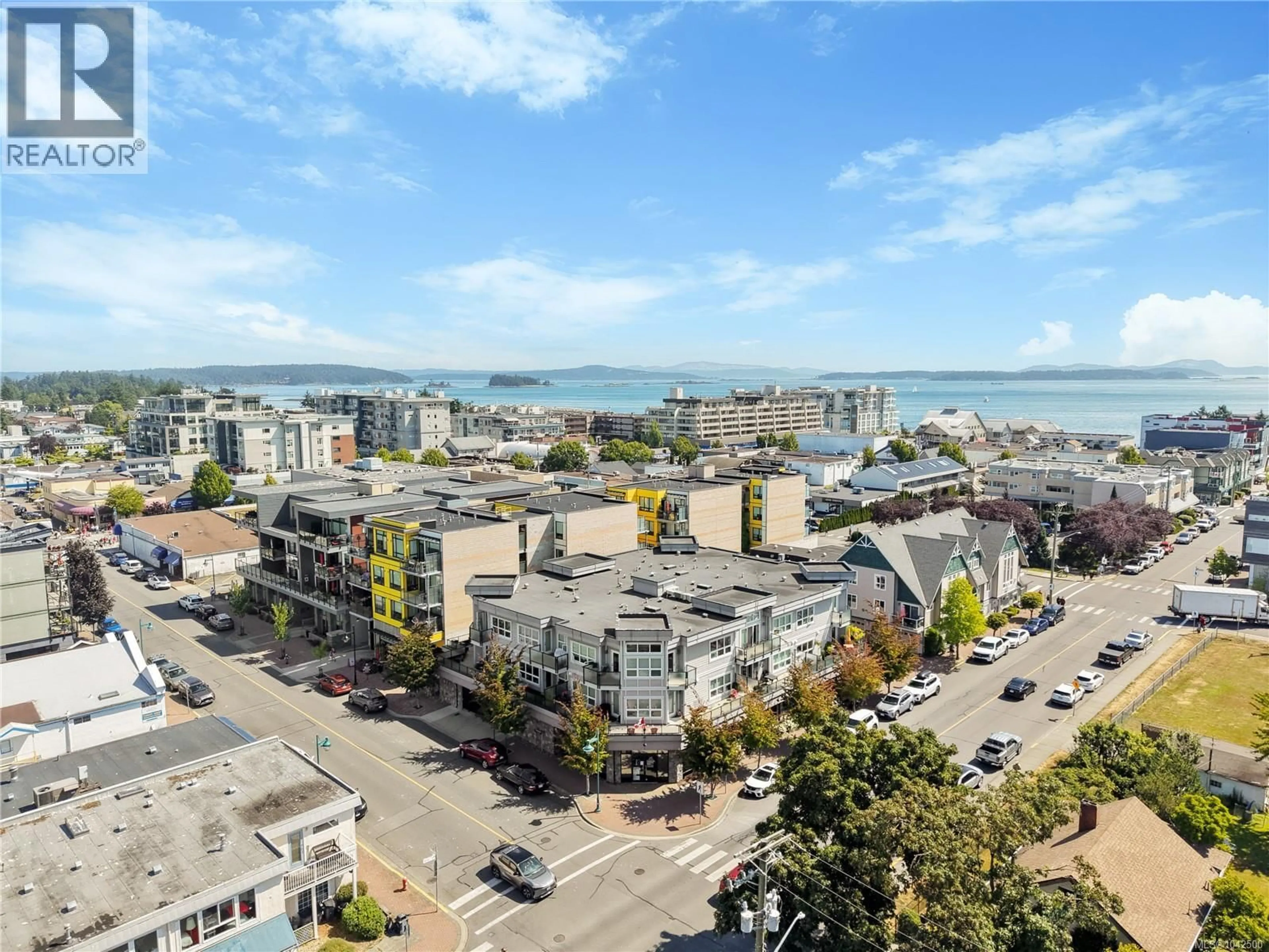 A pic from outside/outdoor area/front of a property/back of a property/a pic from drone, city buildings view from balcony for 308 - 9751 FOURTH STREET, Sidney British Columbia V8L2Y9