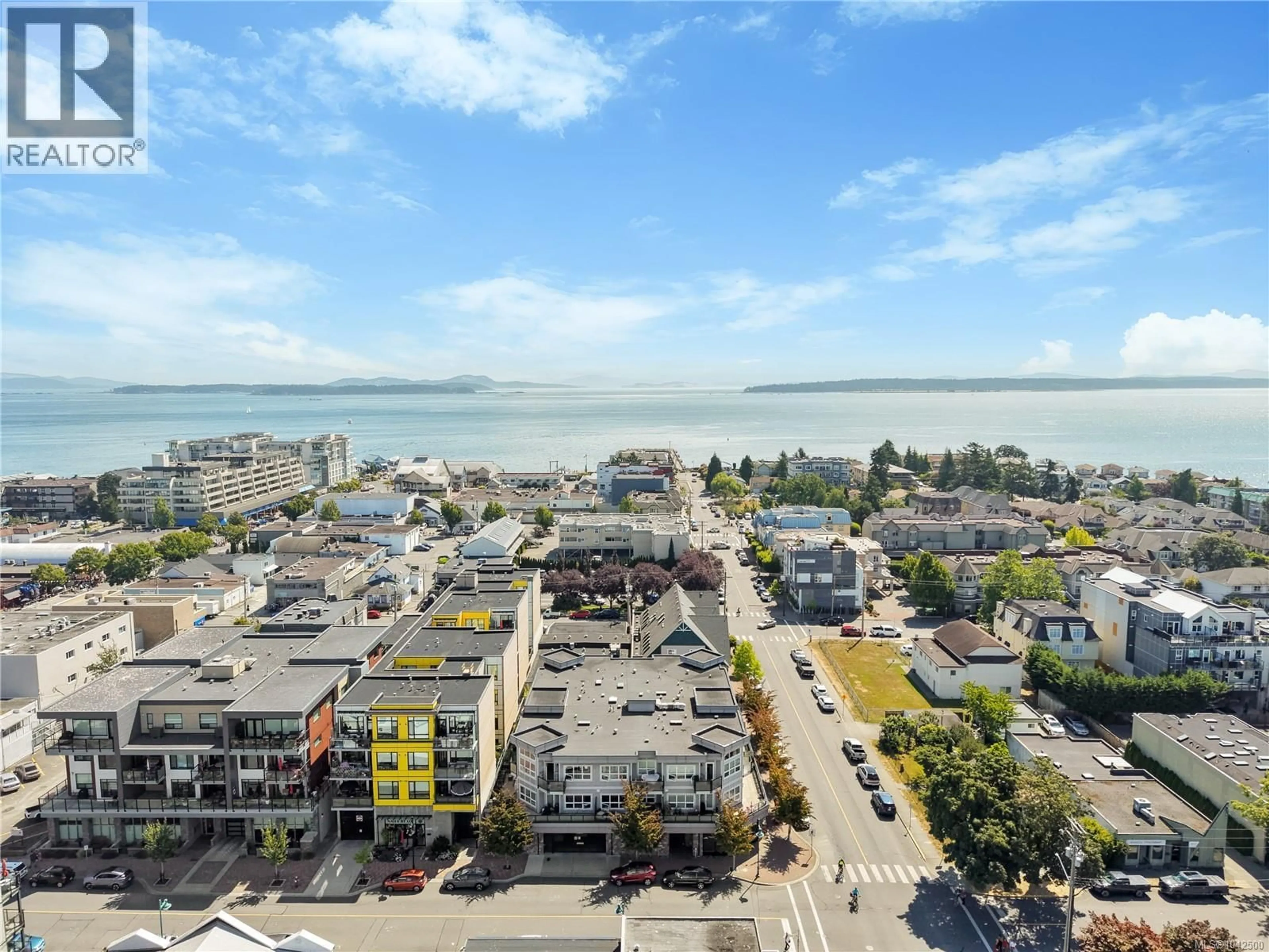 A pic from outside/outdoor area/front of a property/back of a property/a pic from drone, city buildings view from balcony for 308 - 9751 FOURTH STREET, Sidney British Columbia V8L2Y9