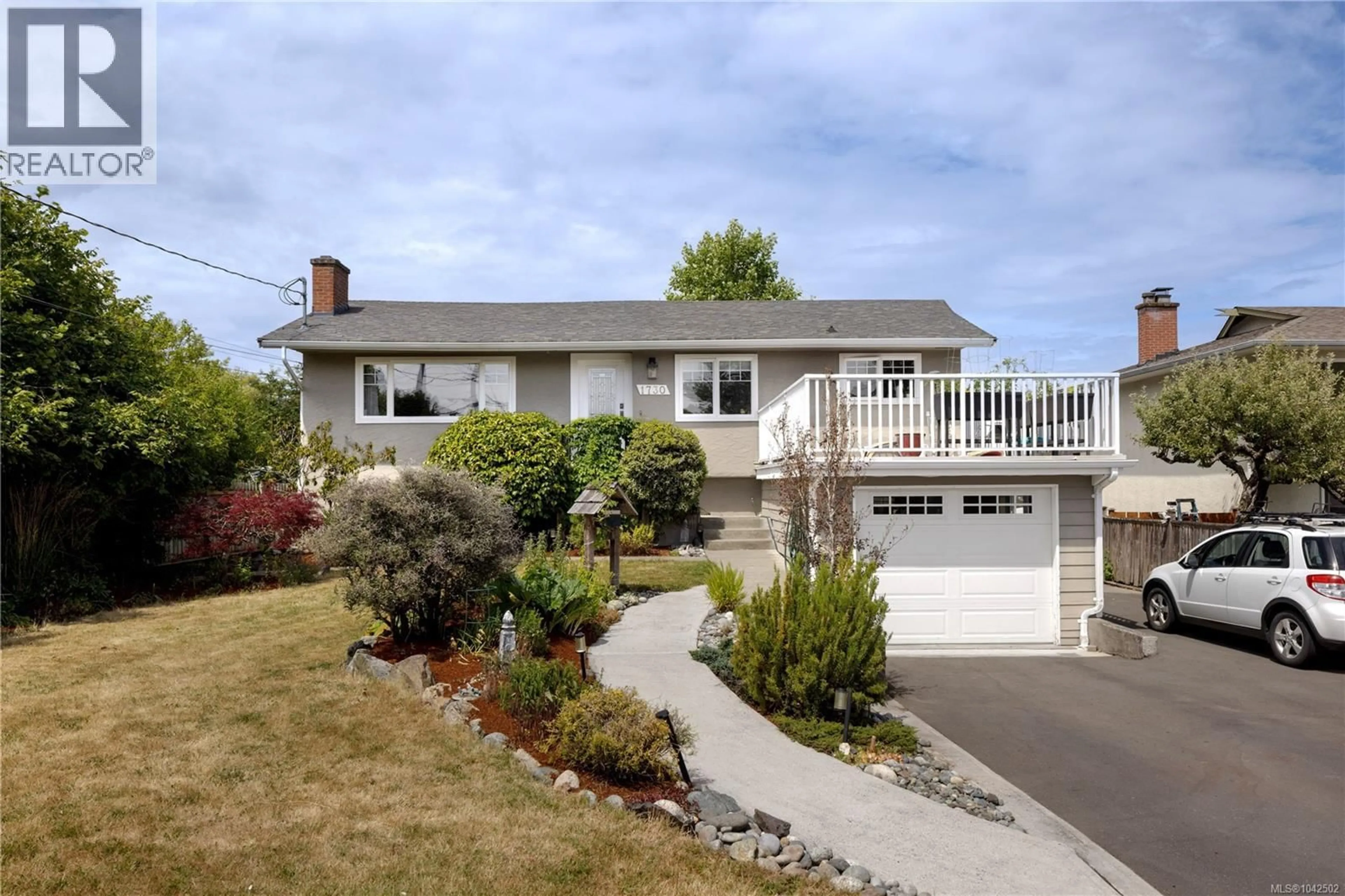 Home with vinyl exterior material, street for 1730 CHRISTMAS AVENUE, Saanich British Columbia V8P2X9