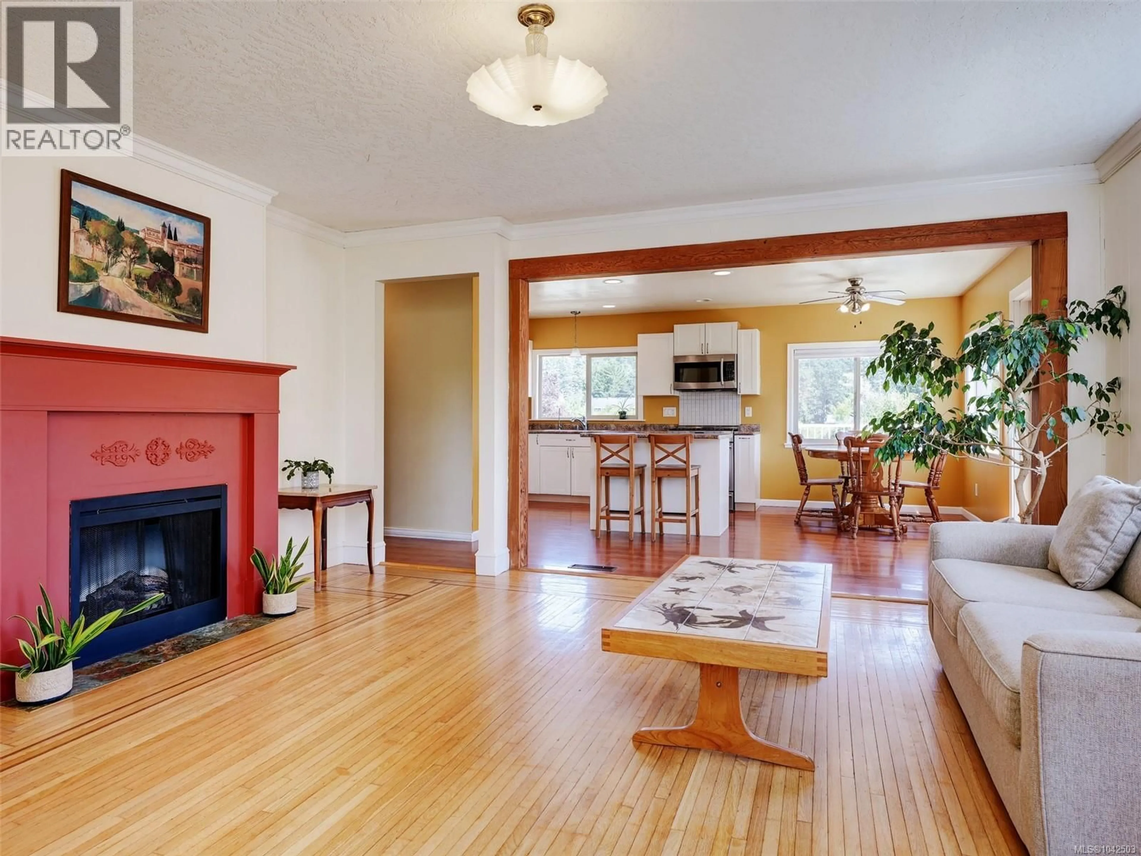 Living room with furniture, wood/laminate floor for 798 WAIN ROAD, North Saanich British Columbia V8L5N8
