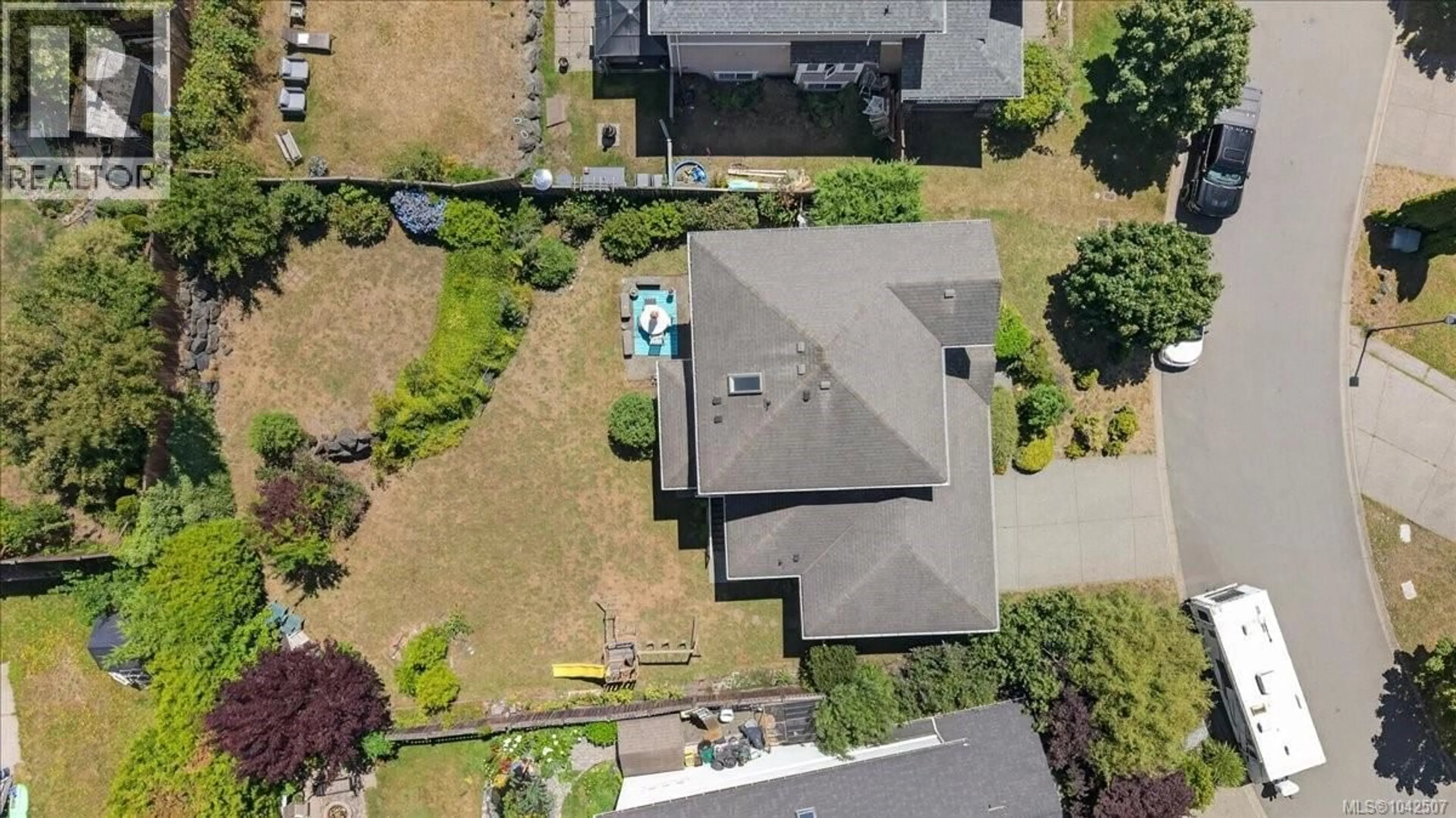 A pic from outside/outdoor area/front of a property/back of a property/a pic from drone, street for 6524 STONEWOOD DRIVE, Sooke British Columbia V9Z0Y6