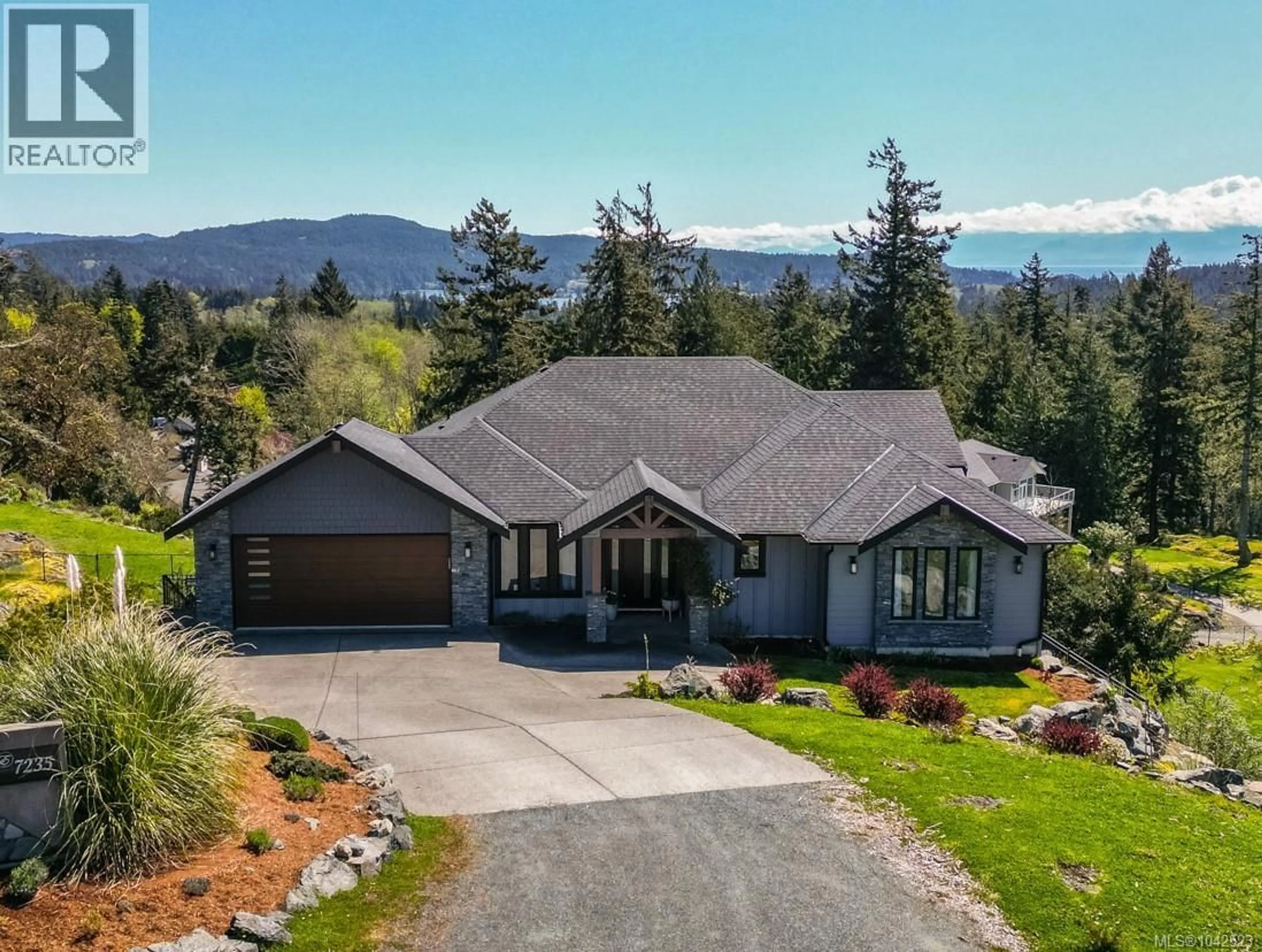 A pic from outside/outdoor area/front of a property/back of a property/a pic from drone, mountain view for 7235 SPAR TREE WAY, Sooke British Columbia V9Z1M8