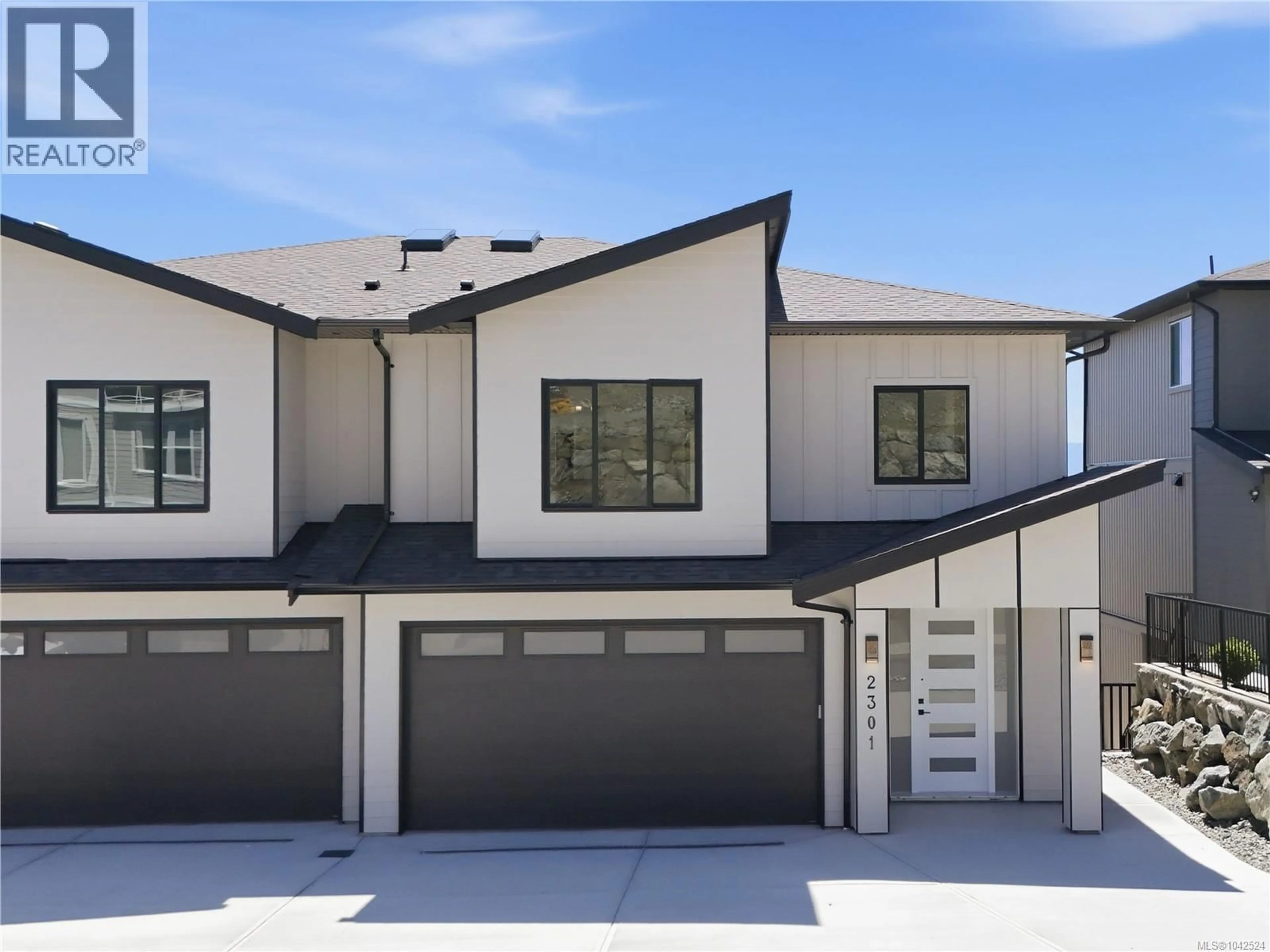 Home with vinyl exterior material, street for 2301 HUDSON TERRACE, Sooke British Columbia V9Z1R2