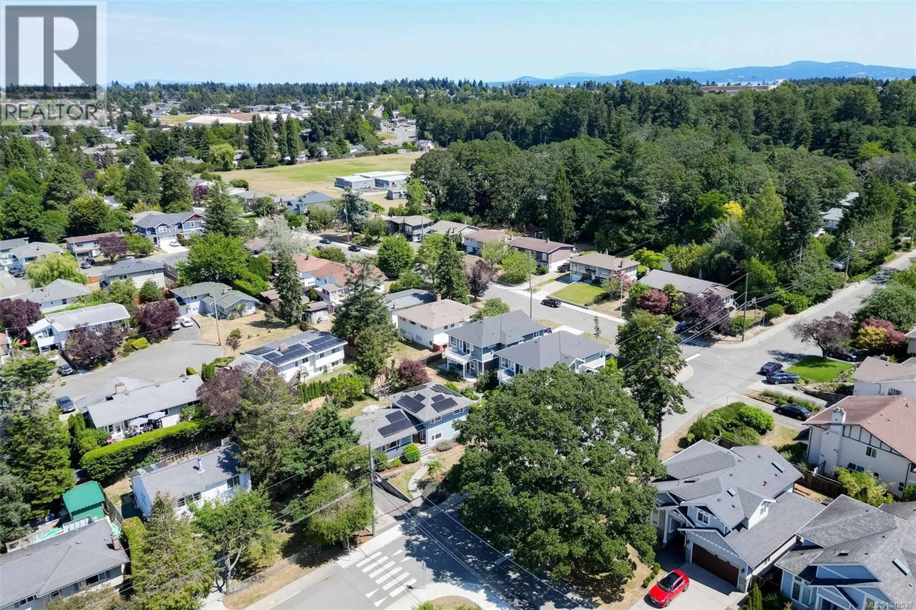 A pic from outside/outdoor area/front of a property/back of a property/a pic from drone, unknown for 1762 MIDGARD AVENUE, Saanich British Columbia V8P2Y7