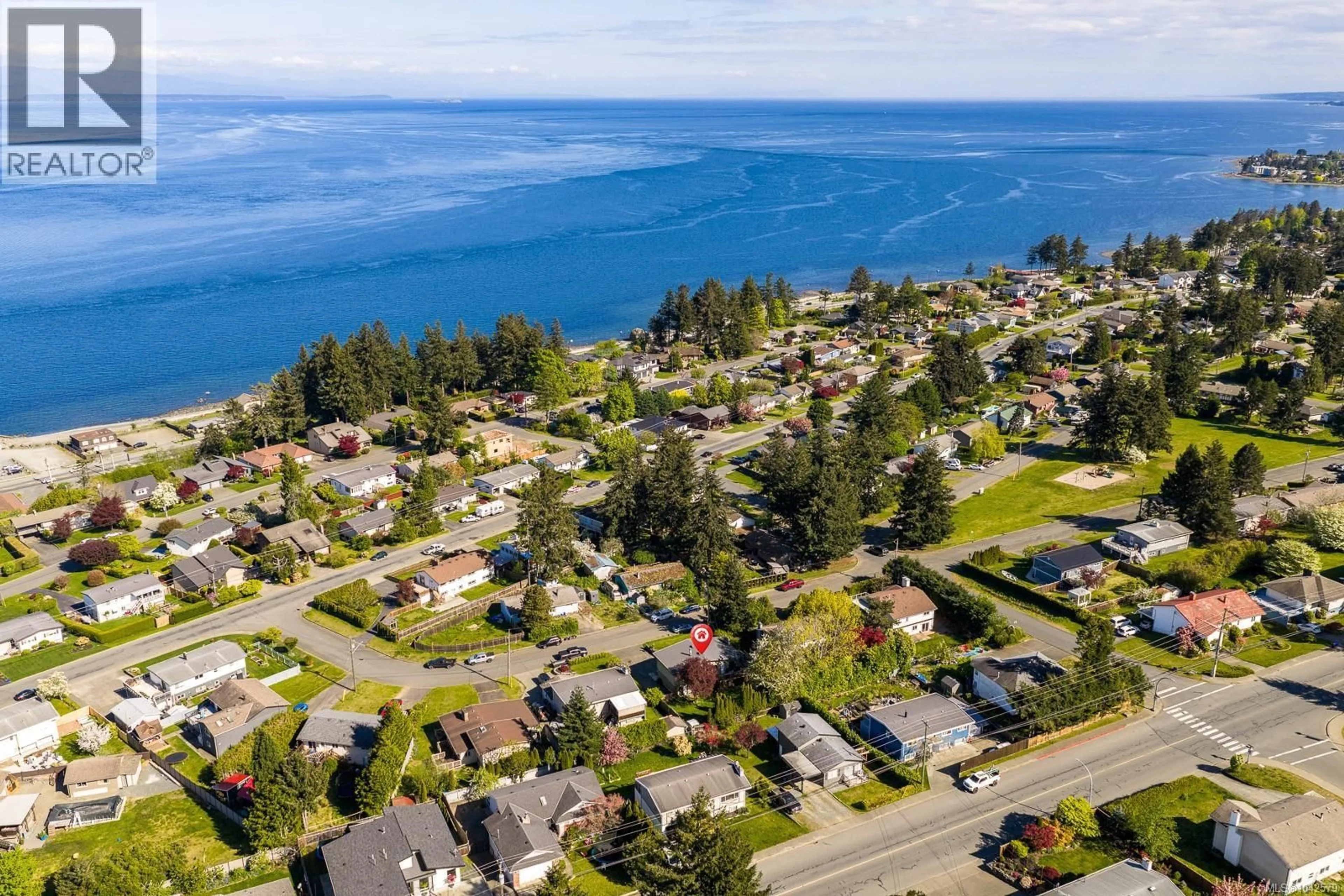 A pic from outside/outdoor area/front of a property/back of a property/a pic from drone, water/lake/river/ocean view for 1068 RUBY ROAD, Campbell River British Columbia V9W1M8