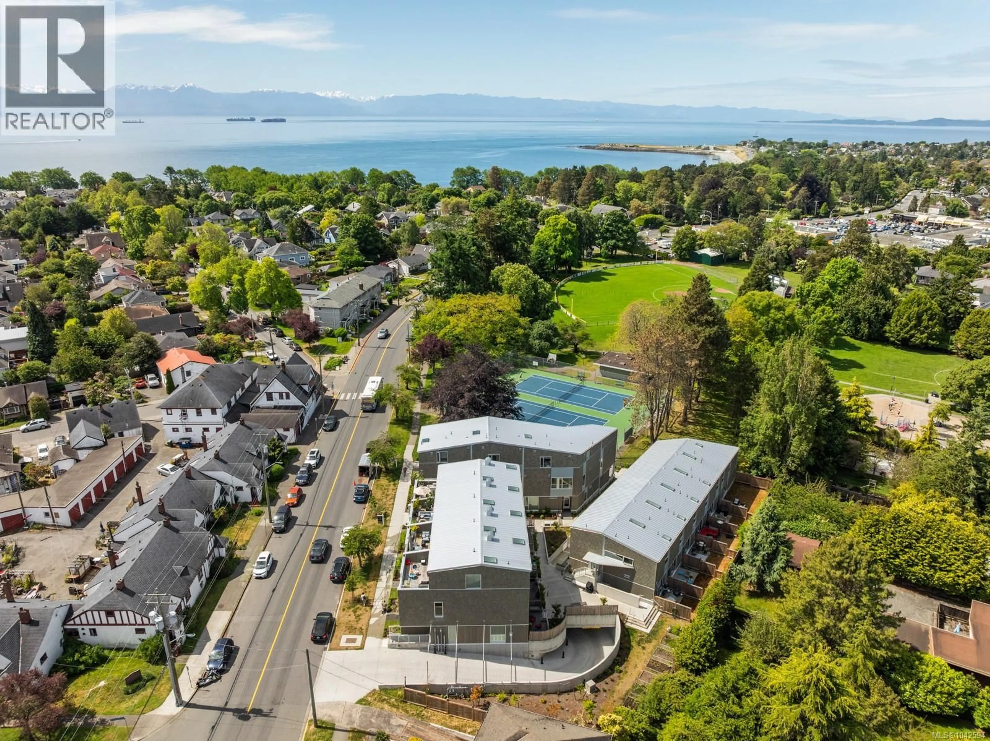 A pic from outside/outdoor area/front of a property/back of a property/a pic from drone, unknown for 105 - 1720 FAIRFIELD ROAD, Victoria British Columbia V8S1G3