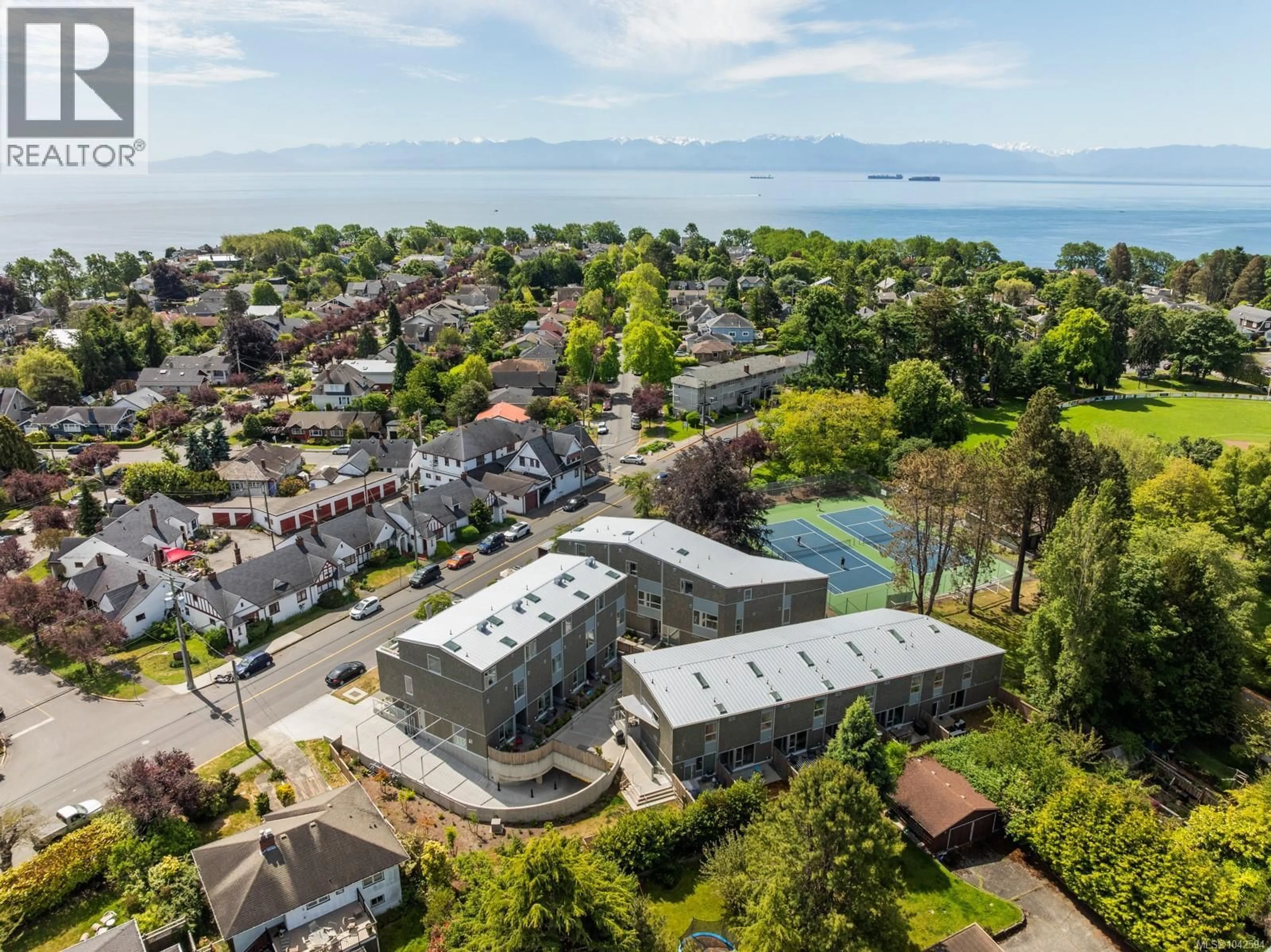 A pic from outside/outdoor area/front of a property/back of a property/a pic from drone, unknown for 105 - 1720 FAIRFIELD ROAD, Victoria British Columbia V8S1G3
