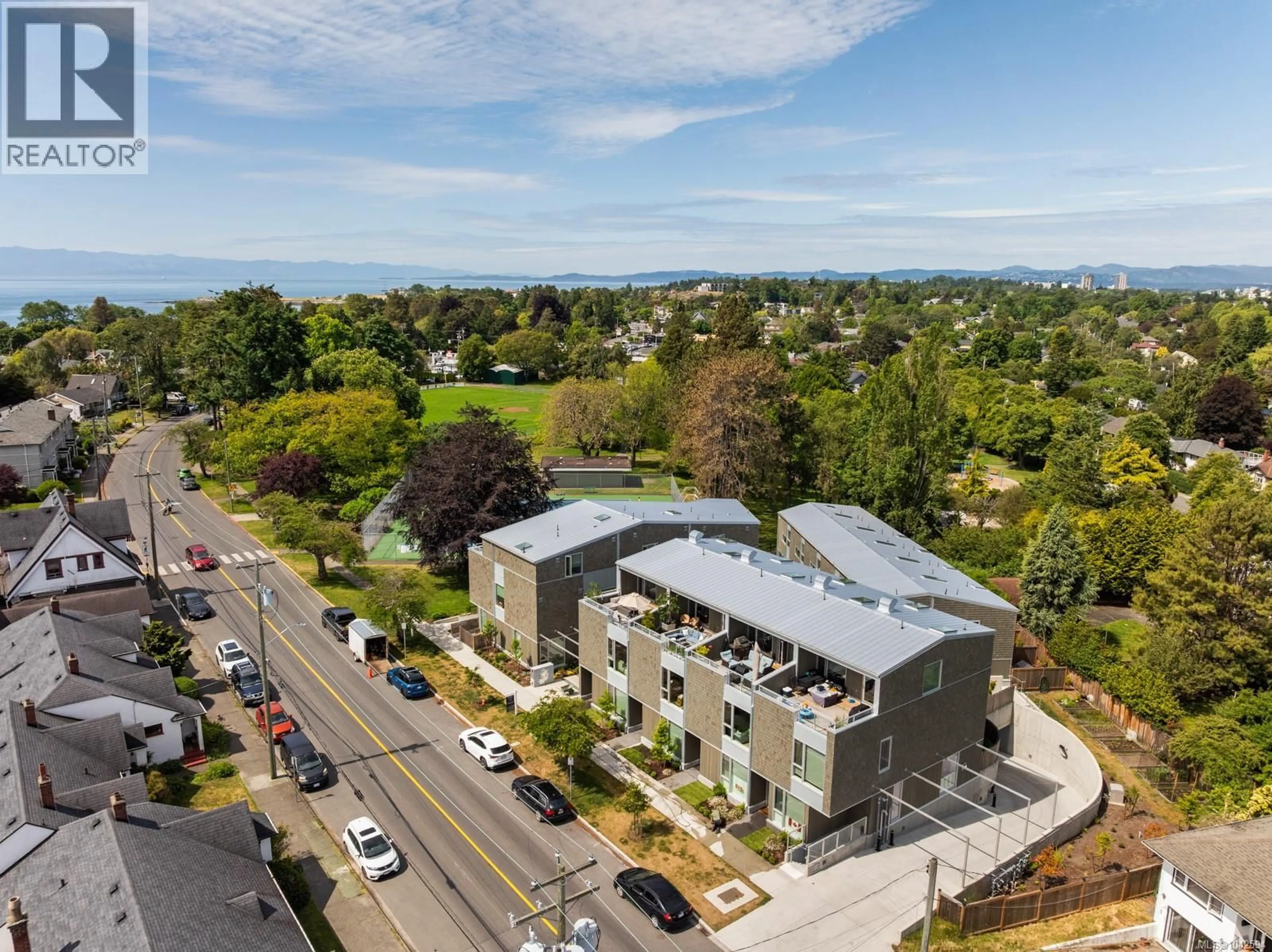 A pic from outside/outdoor area/front of a property/back of a property/a pic from drone, unknown for 105 - 1720 FAIRFIELD ROAD, Victoria British Columbia V8S1G3
