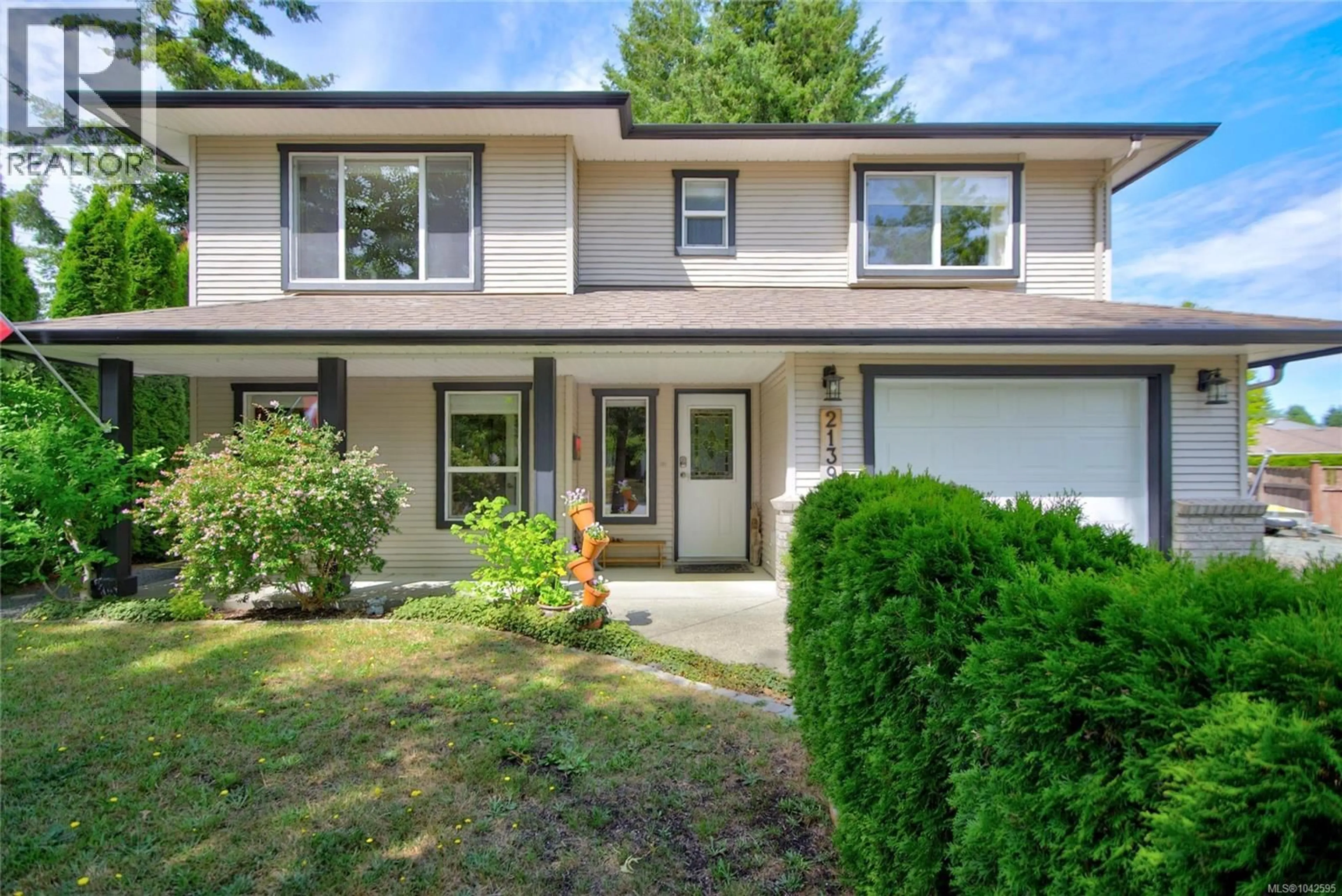 Home with vinyl exterior material, street for 2139 STIRLING PLACE, Courtenay British Columbia V9N9X1