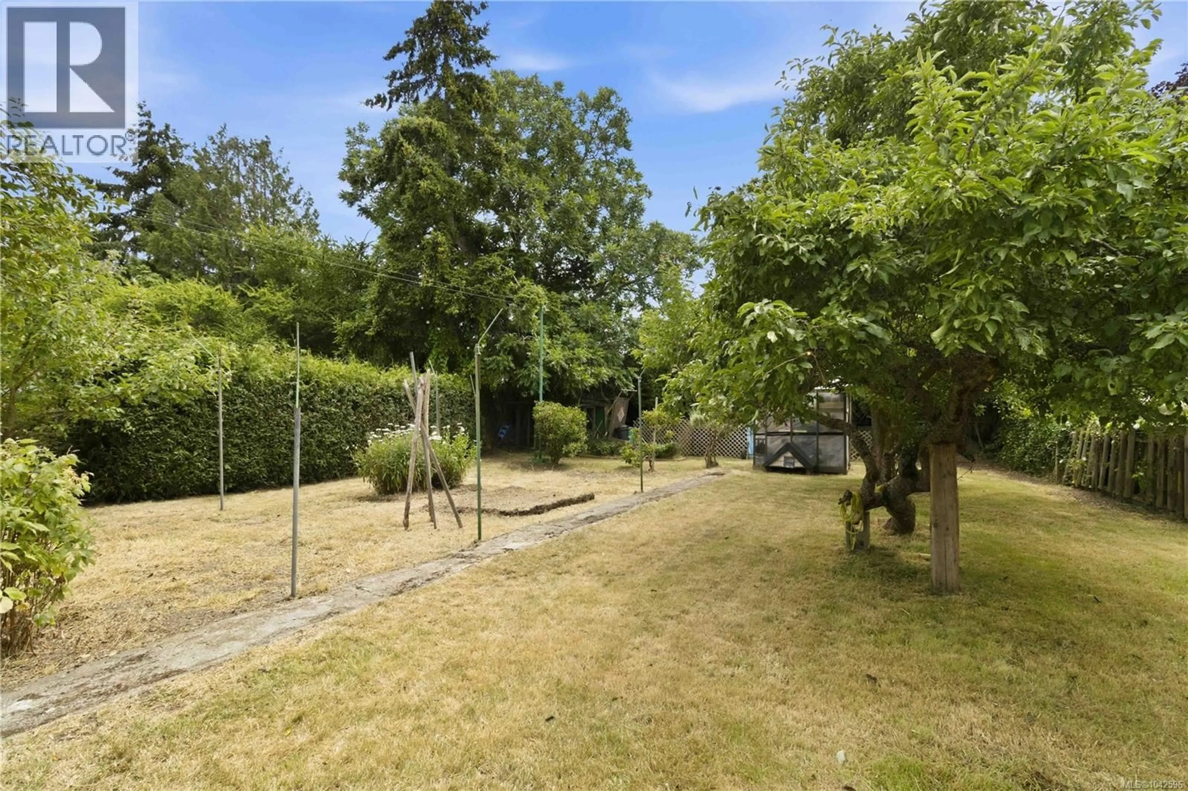 A pic from outside/outdoor area/front of a property/back of a property/a pic from drone, forest/trees view for 1219 JUNO STREET, Esquimalt British Columbia V9A5J9