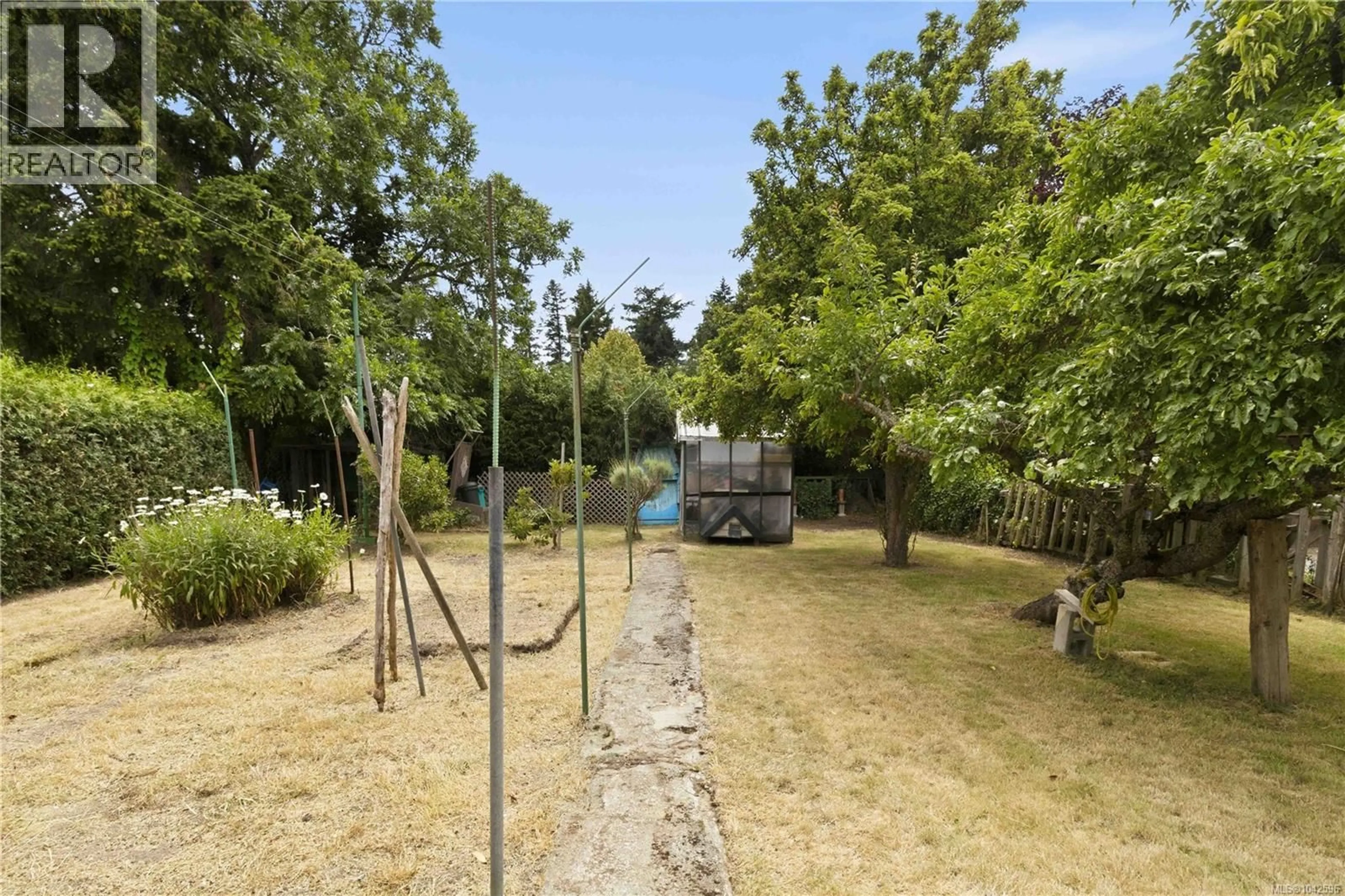 A pic from outside/outdoor area/front of a property/back of a property/a pic from drone, forest/trees view for 1219 JUNO STREET, Esquimalt British Columbia V9A5J9
