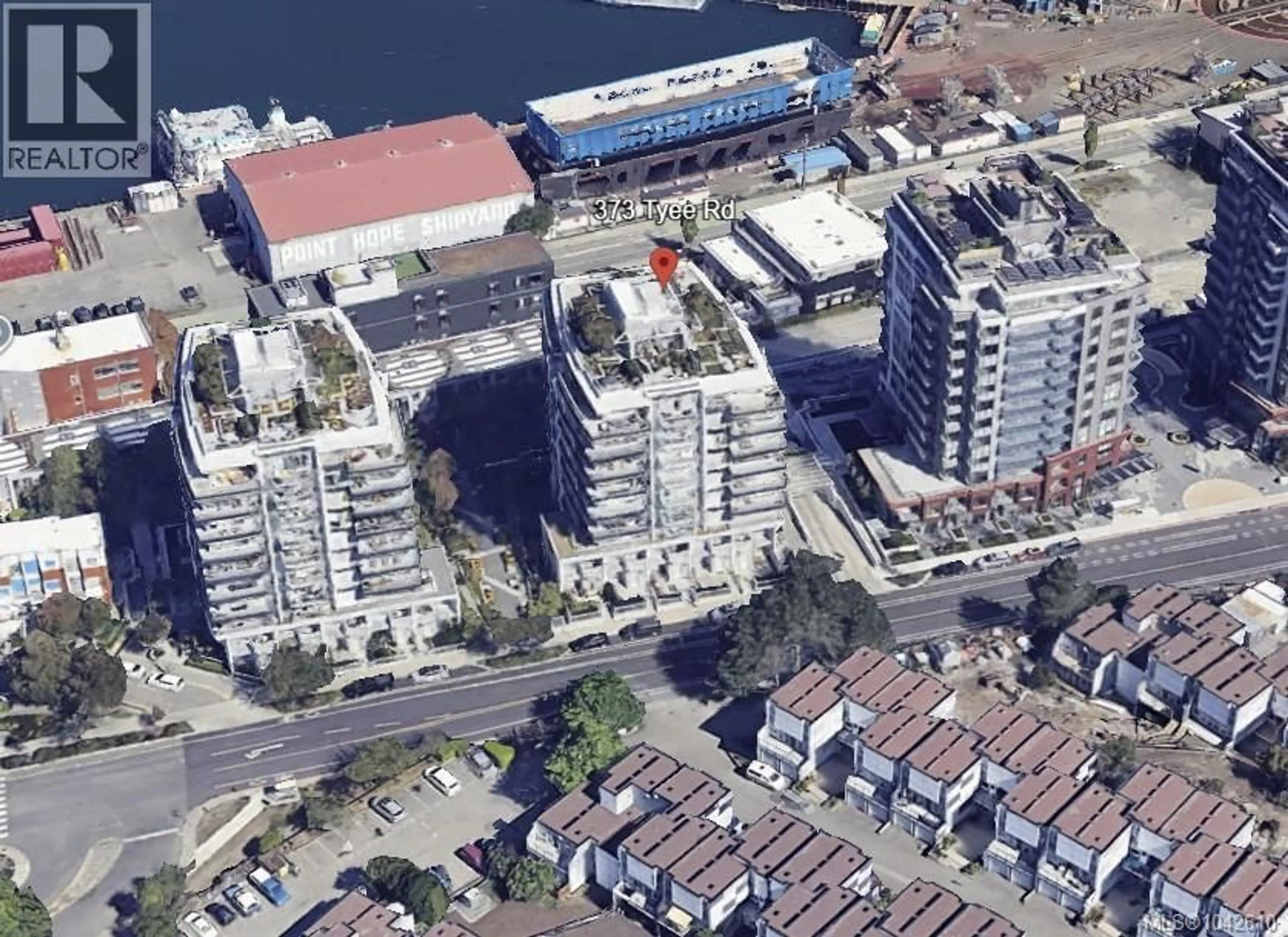 A pic from outside/outdoor area/front of a property/back of a property/a pic from drone, unknown for 303 - 373 TYEE ROAD, Victoria British Columbia V9A0B3