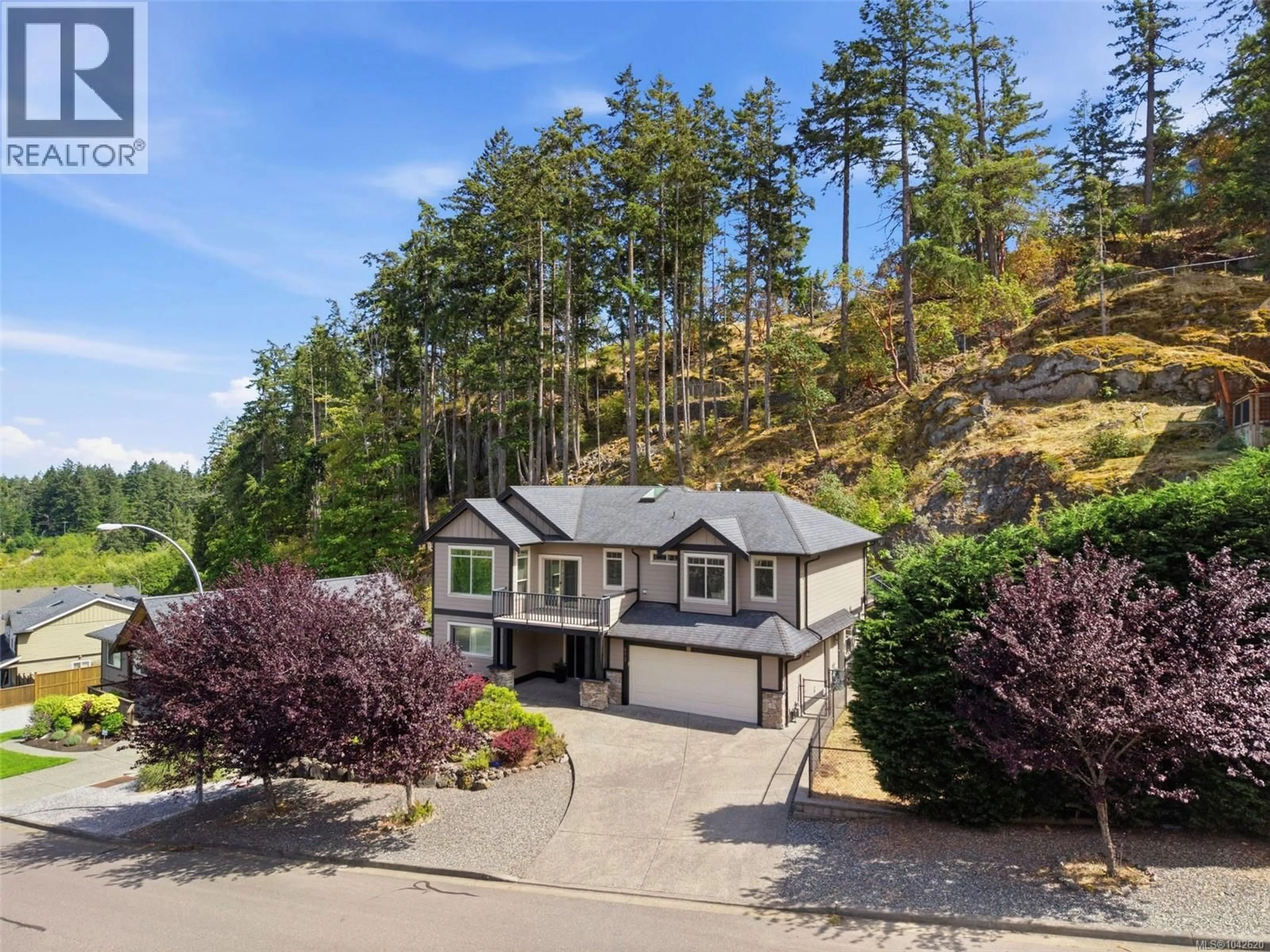 A pic from outside/outdoor area/front of a property/back of a property/a pic from drone, mountain view for 473 NOTTINGHAM DRIVE, Nanaimo British Columbia V9T0C2