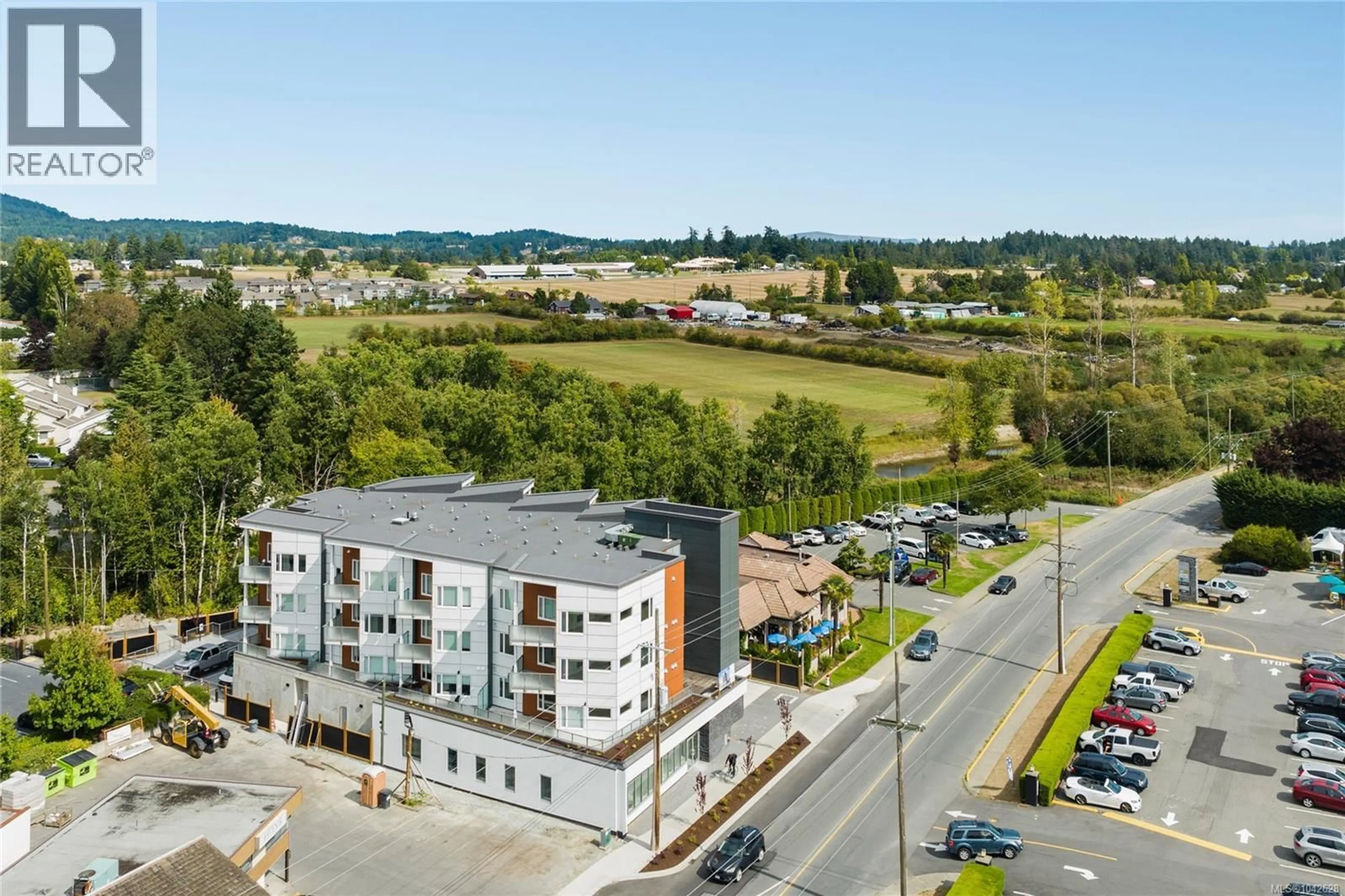 A pic from outside/outdoor area/front of a property/back of a property/a pic from drone, city buildings view from balcony for 203 - 7098 WALLACE DRIVE, Central Saanich British Columbia V8M1G9