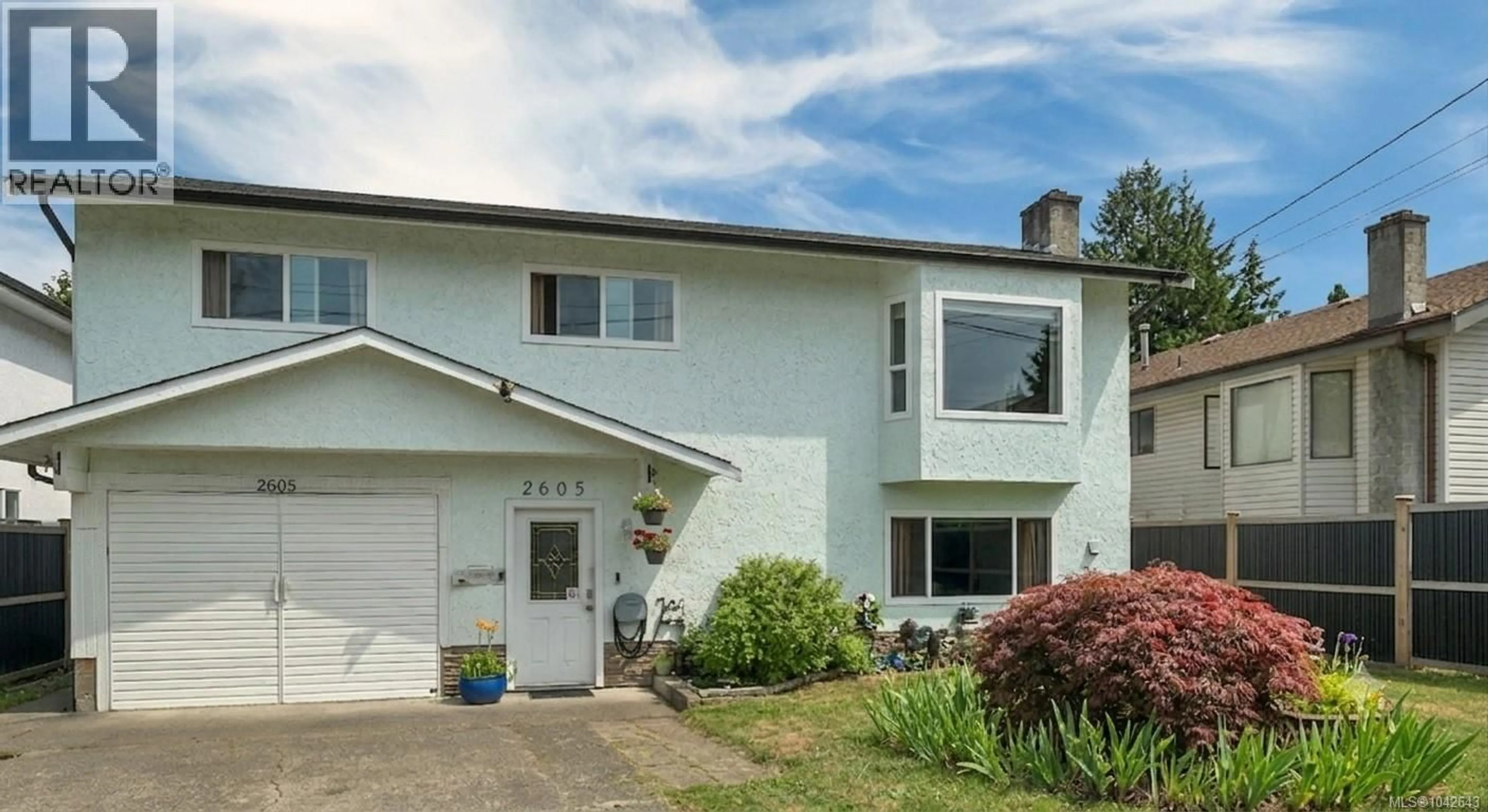 Home with vinyl exterior material, street for 2605 SODERHOLM ROAD, Campbell River British Columbia V9W1M2