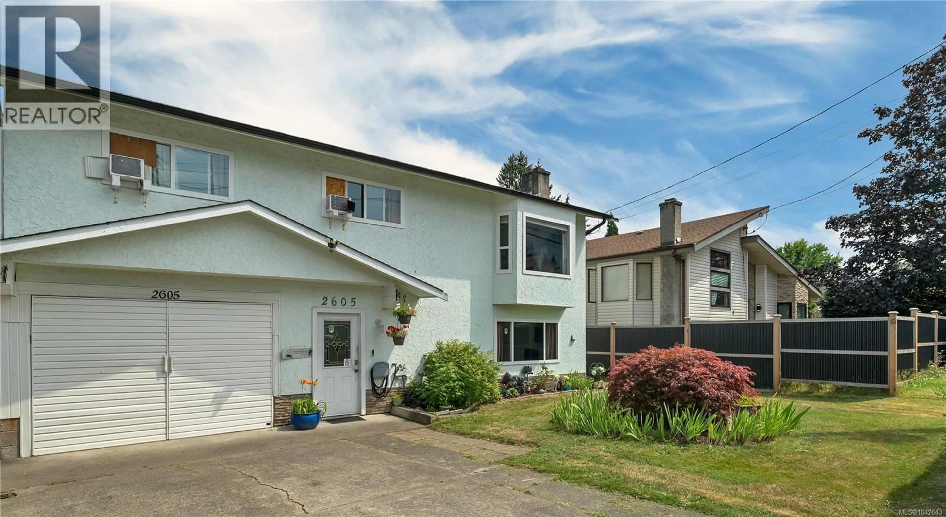Home with vinyl exterior material, street for 2605 SODERHOLM ROAD, Campbell River British Columbia V9W1M2