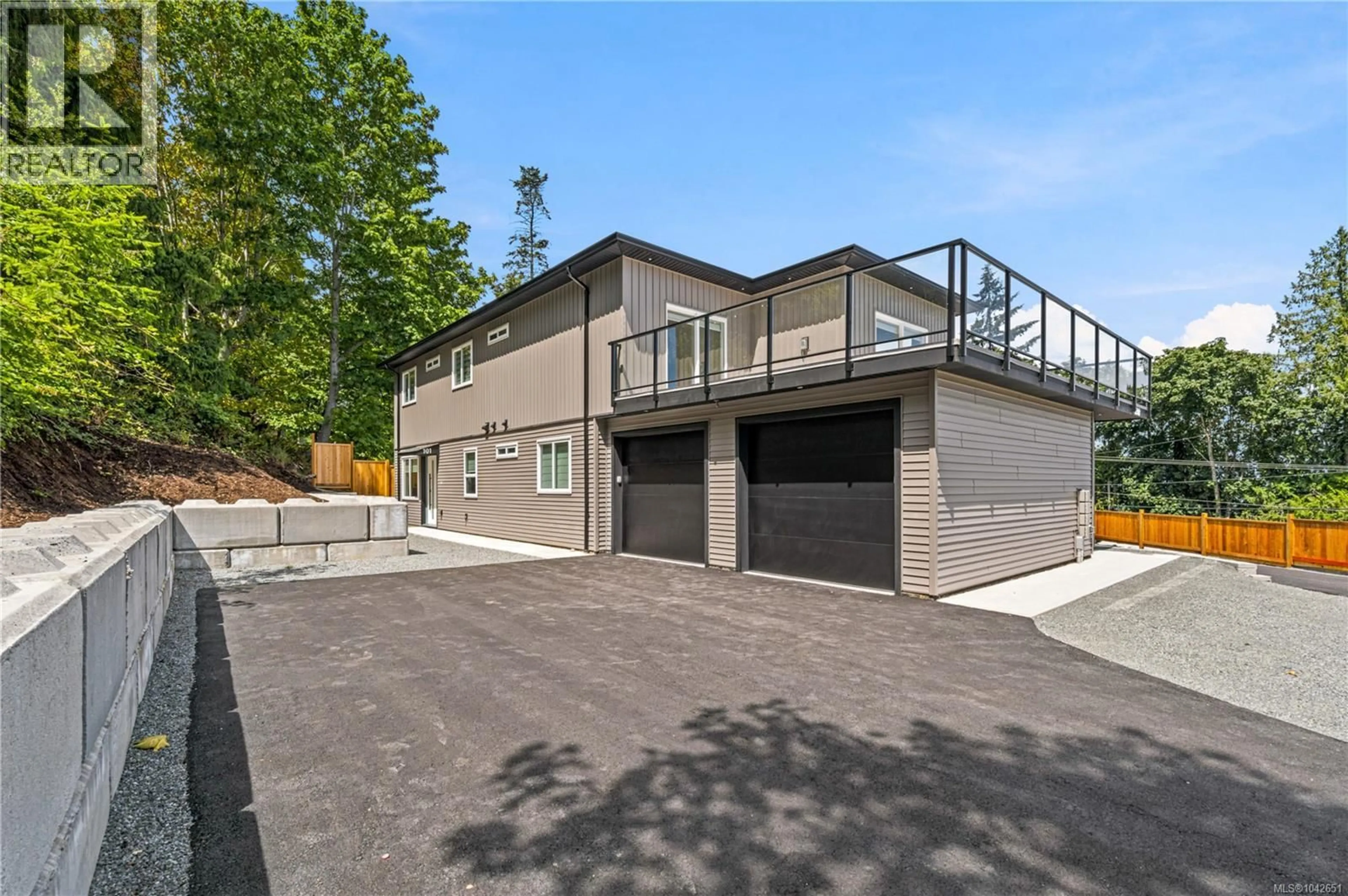 A pic from outside/outdoor area/front of a property/back of a property/a pic from drone, street for 101 - 5309 TOMS TURNABOUT, Nanaimo British Columbia V9T5M9