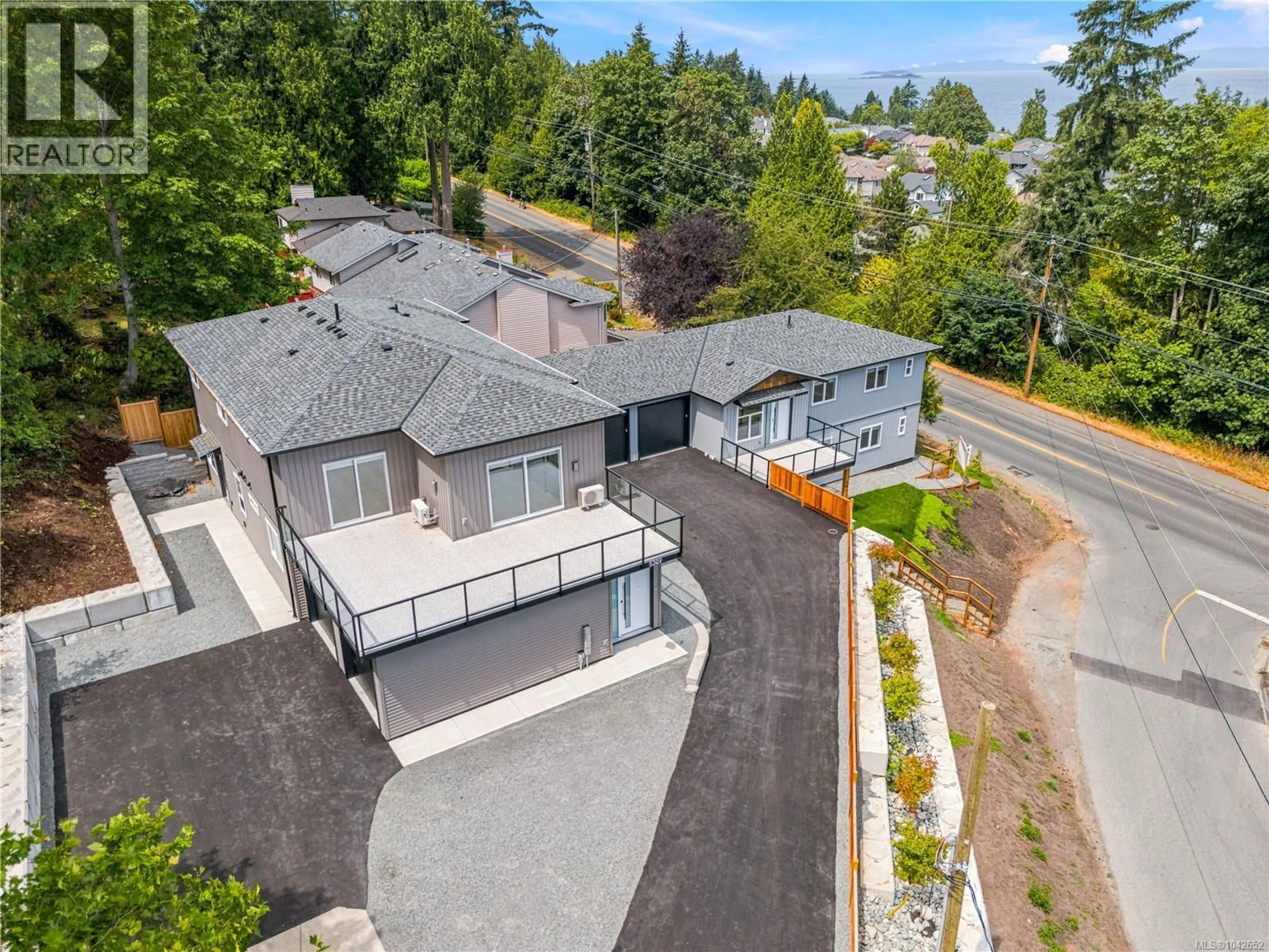 A pic from outside/outdoor area/front of a property/back of a property/a pic from drone, street for 201 - 5309 TOMS TURNABOUT, Nanaimo British Columbia V9T5M9