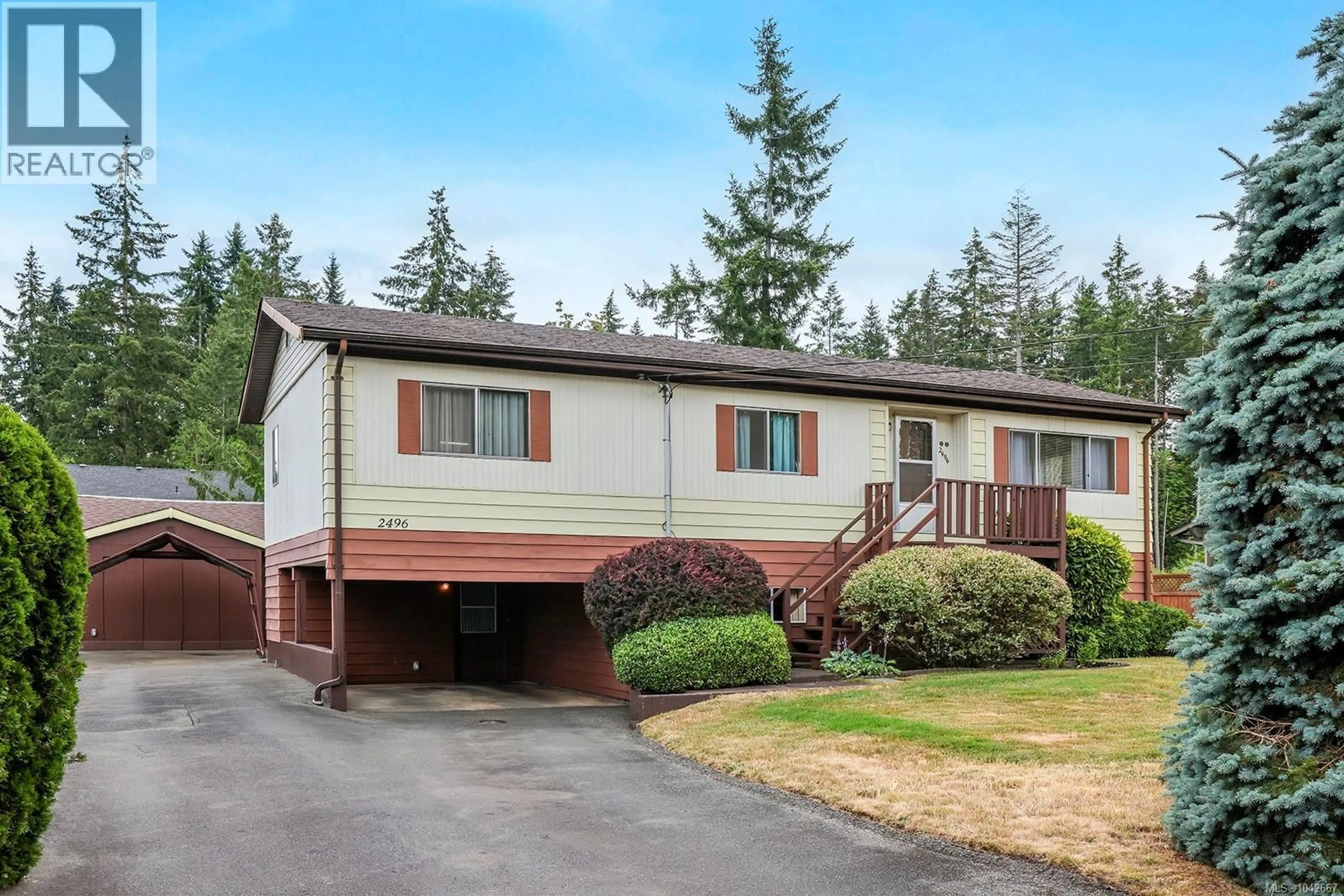 Home with vinyl exterior material, street for 2496 CRYSTAL DRIVE, Courtenay British Columbia V9N9J9