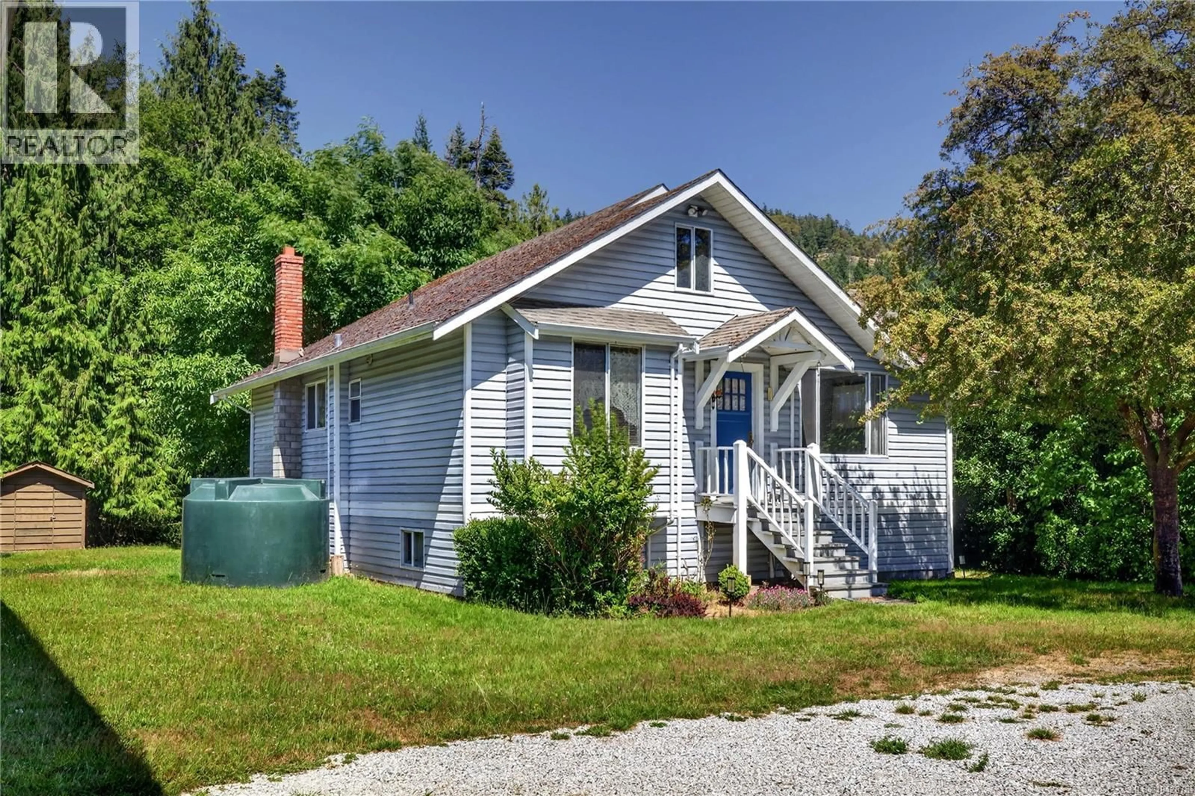 Home with vinyl exterior material, street for 2401 FULFORD-GANGES ROAD, Salt Spring British Columbia V8K1Z4