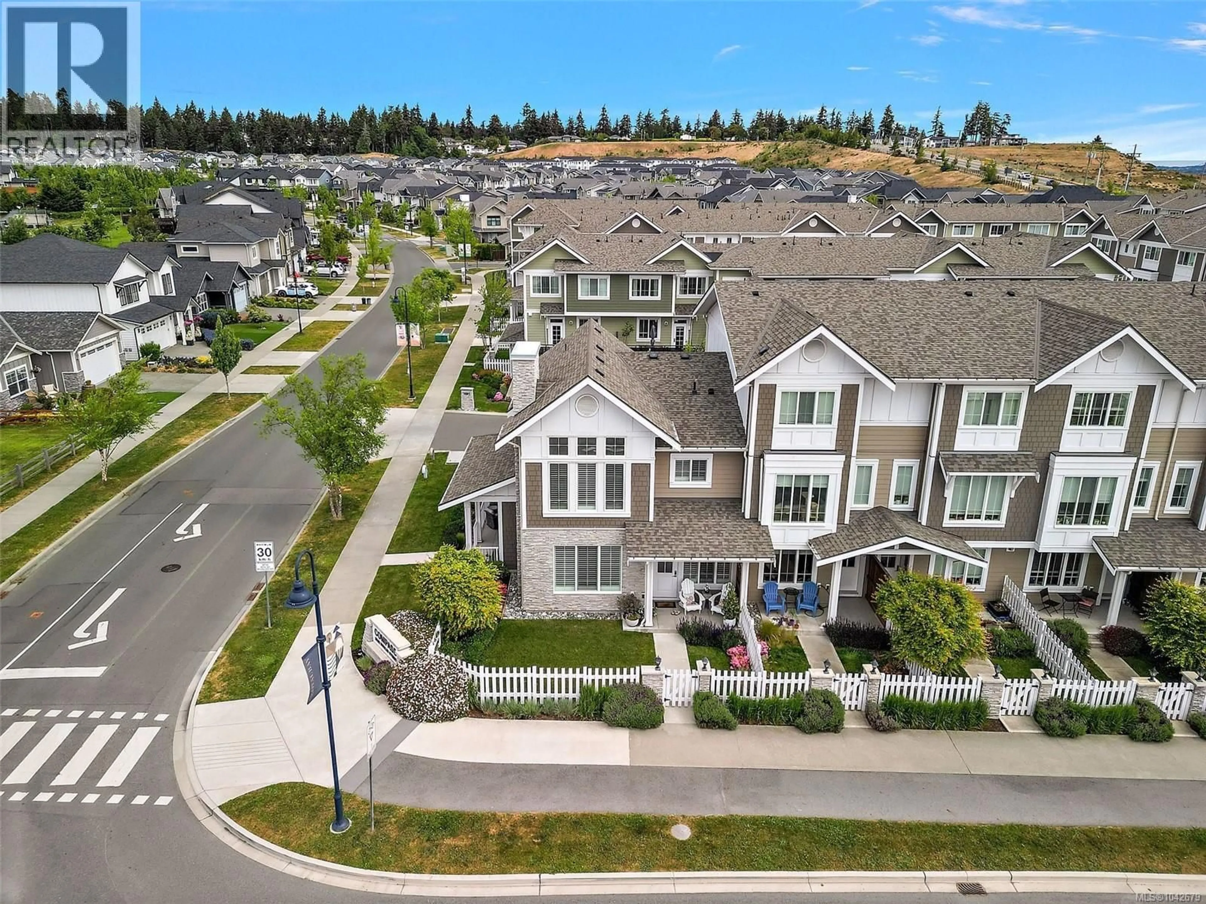 A pic from outside/outdoor area/front of a property/back of a property/a pic from drone, mountain view for 101 - 3501 DUNLIN STREET, Colwood British Columbia V9C0P7