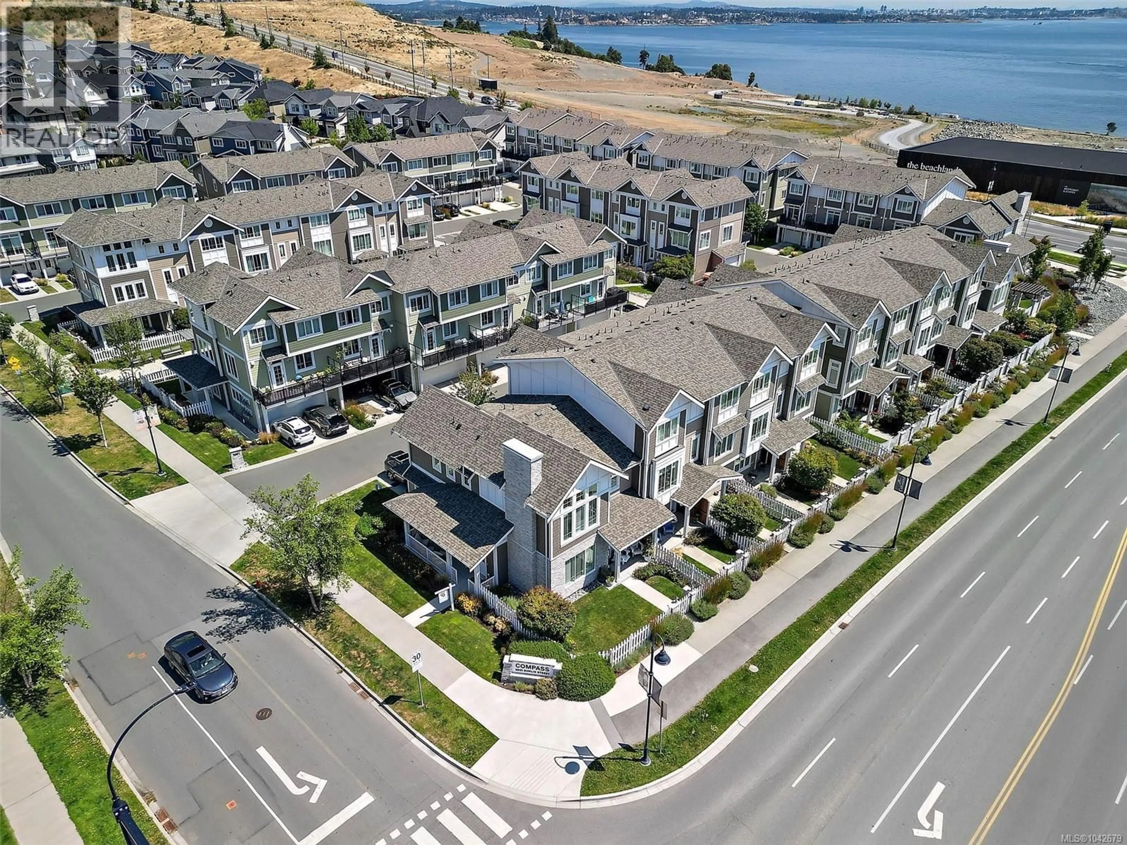 A pic from outside/outdoor area/front of a property/back of a property/a pic from drone, water/lake/river/ocean view for 101 - 3501 DUNLIN STREET, Colwood British Columbia V9C0P7