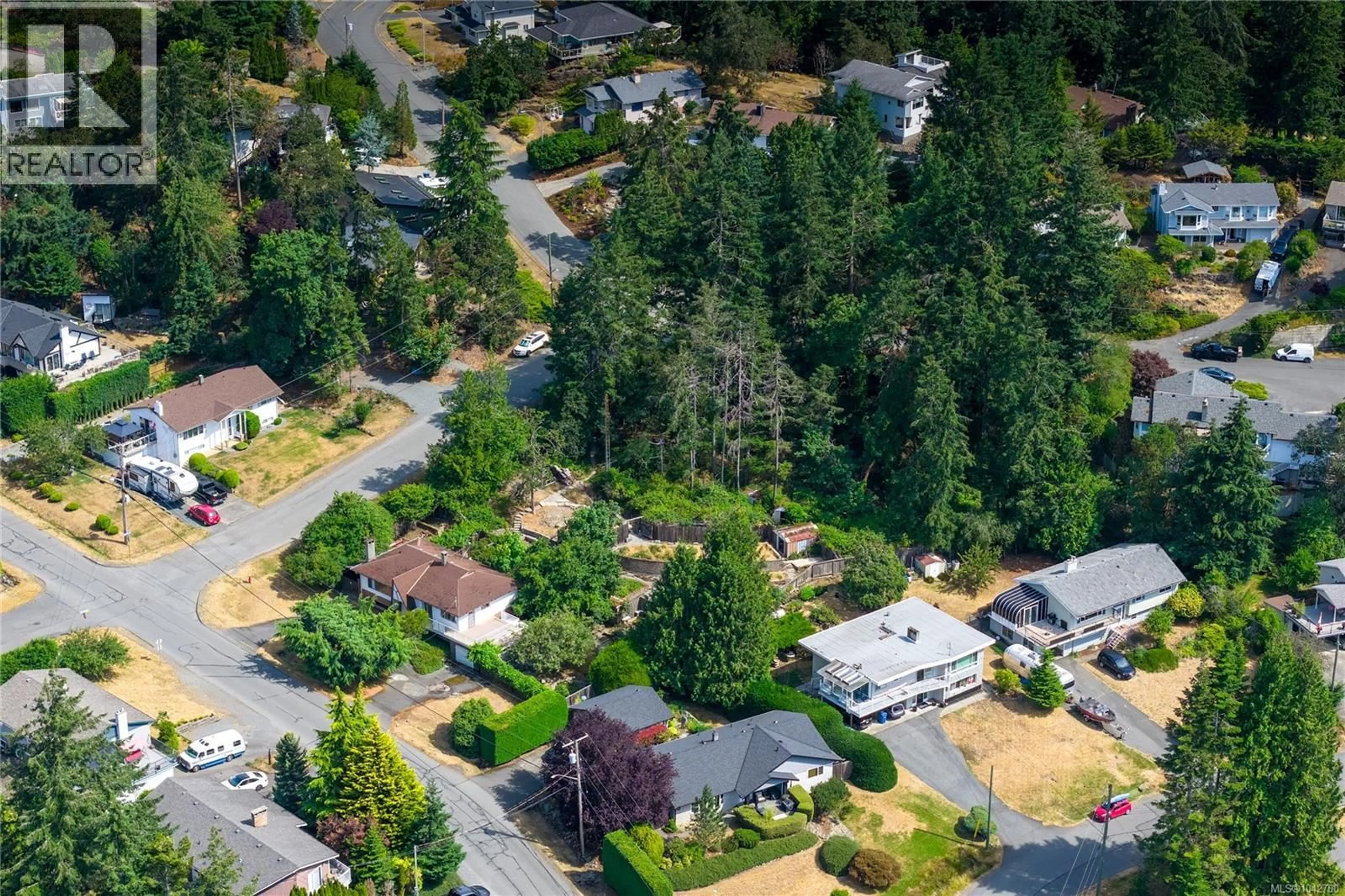 A pic from outside/outdoor area/front of a property/back of a property/a pic from drone, street for 2999 KING RICHARD DRIVE, Nanaimo British Columbia V9T1J5
