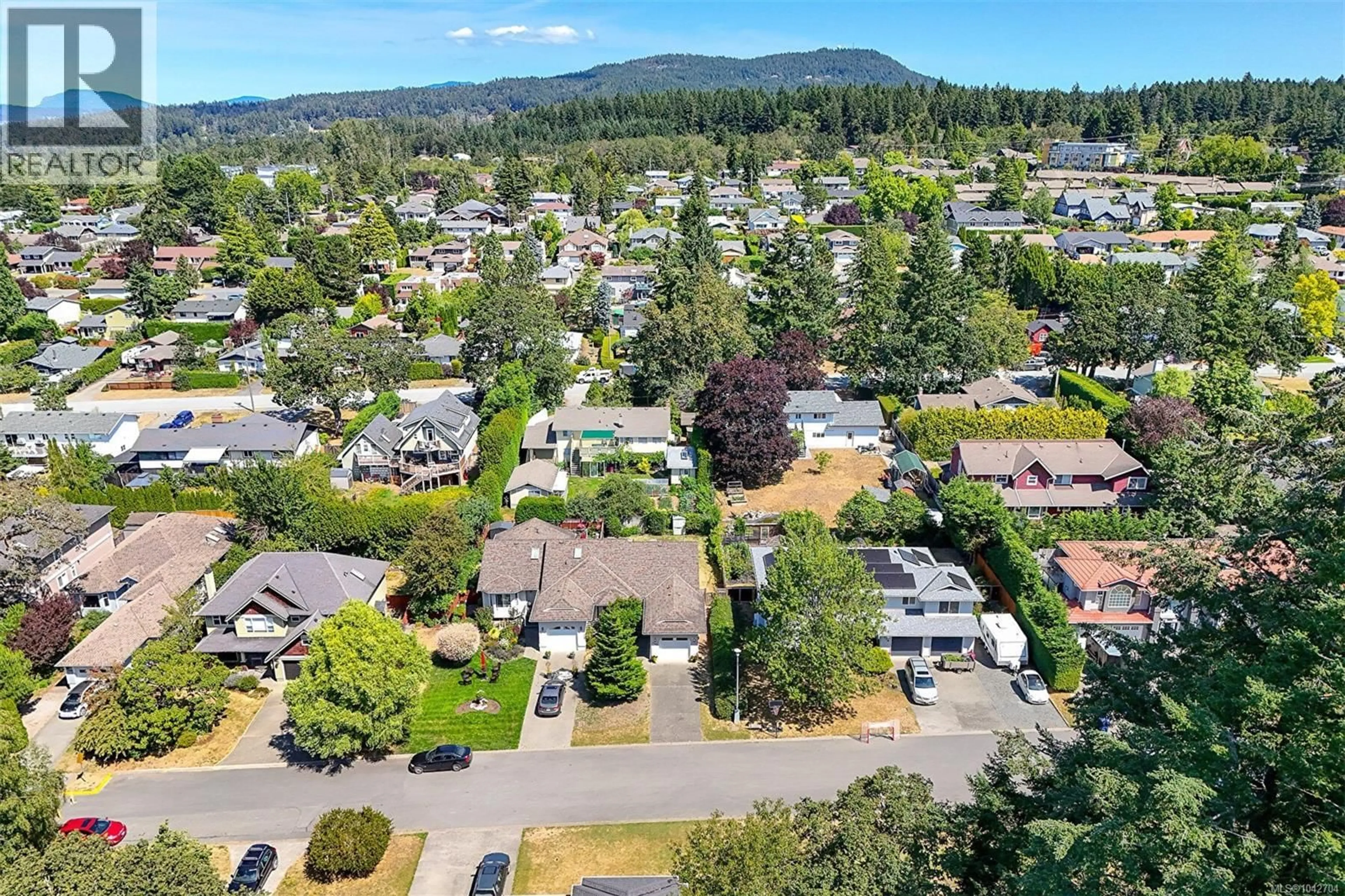 A pic from outside/outdoor area/front of a property/back of a property/a pic from drone, mountain view for 1108 LUCILLE DRIVE, Central Saanich British Columbia V8M1H6
