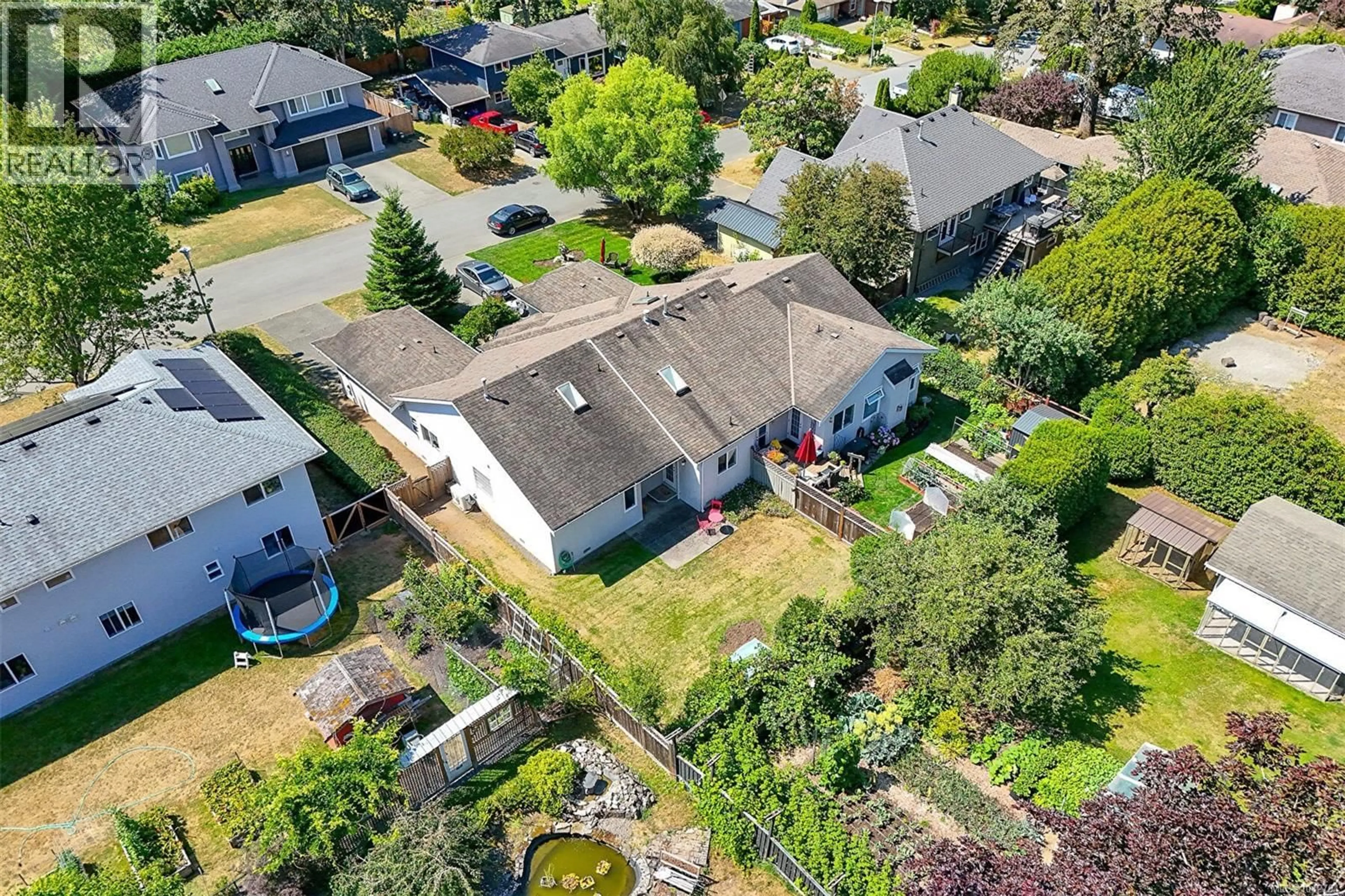 A pic from outside/outdoor area/front of a property/back of a property/a pic from drone, street for 1108 LUCILLE DRIVE, Central Saanich British Columbia V8M1H6