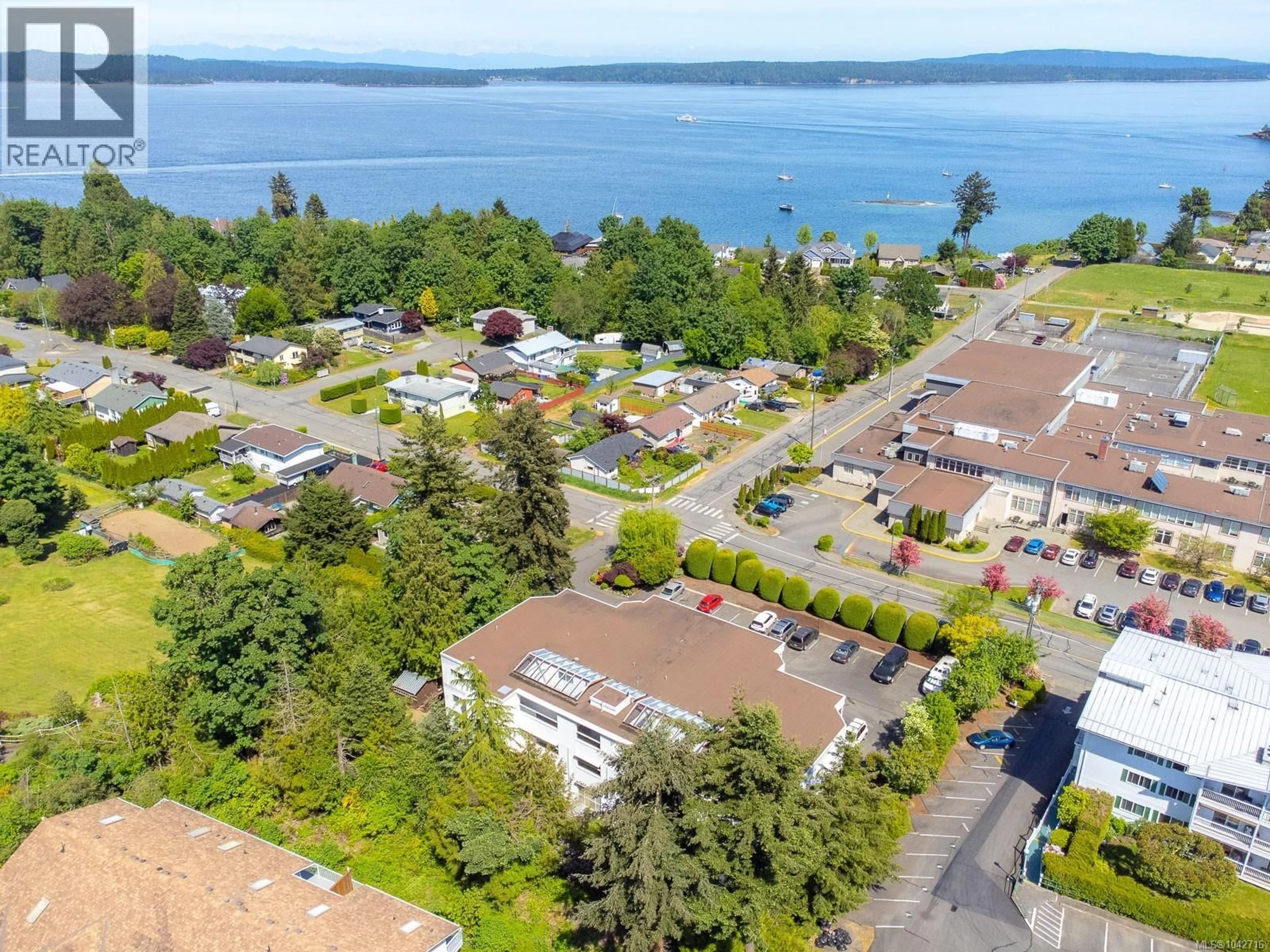 A pic from outside/outdoor area/front of a property/back of a property/a pic from drone, water/lake/river/ocean view for 202 - 9958 DANIEL STREET, Chemainus British Columbia V0R1K2