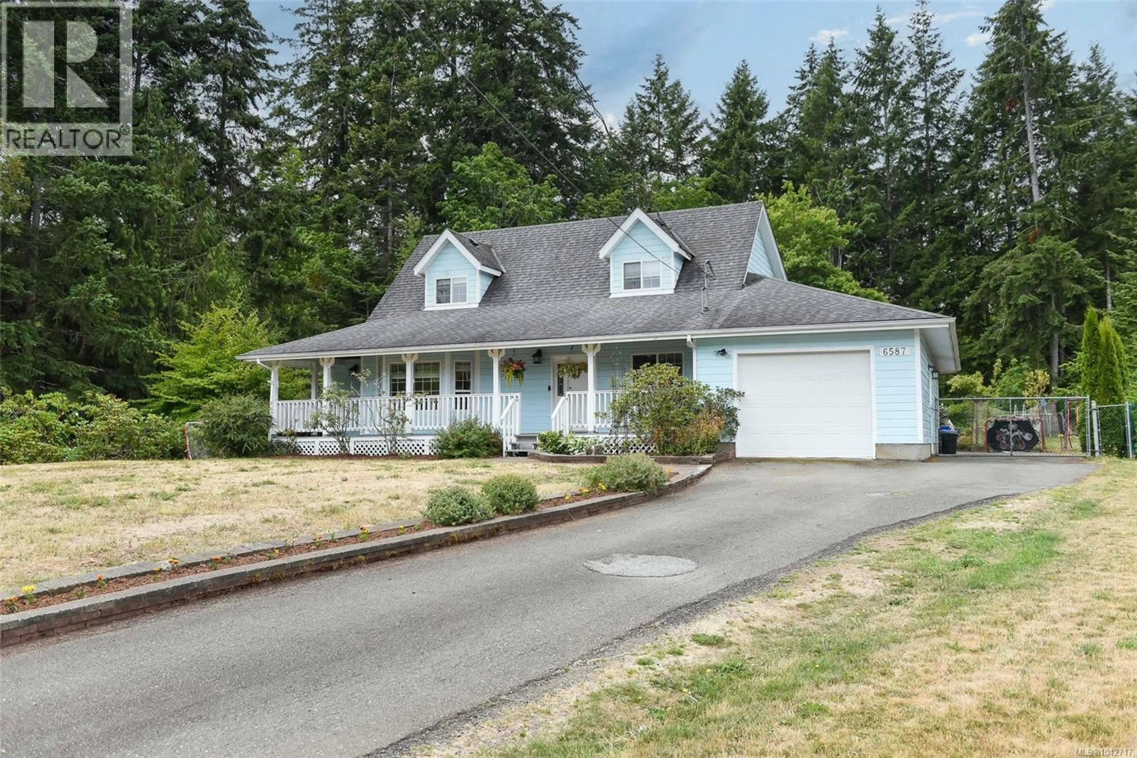 Home with vinyl exterior material, street for 6587 MYSTERY BEACH ROAD, Fanny Bay British Columbia V0R1W0