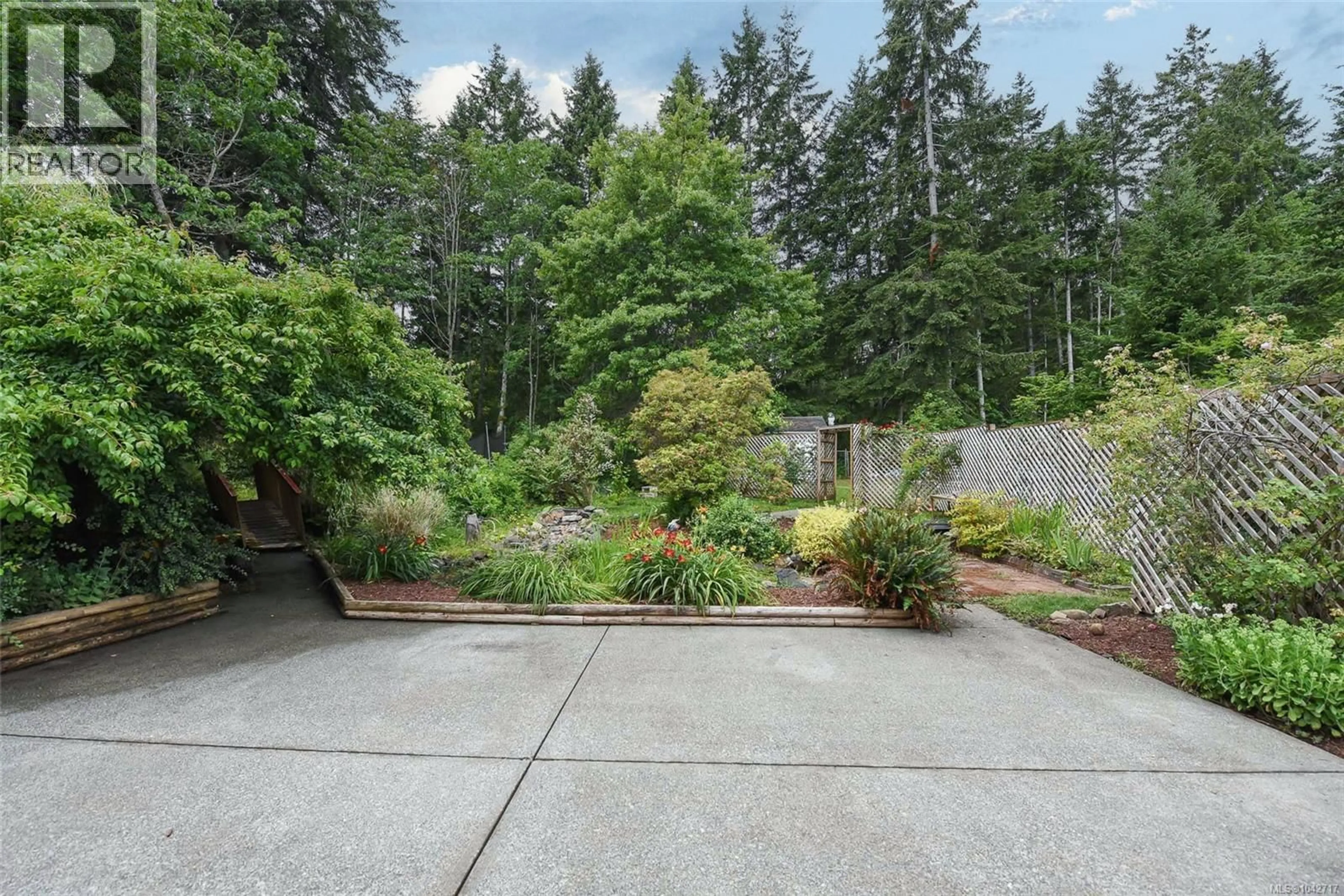 Patio, forest/trees view for 6587 MYSTERY BEACH ROAD, Fanny Bay British Columbia V0R1W0