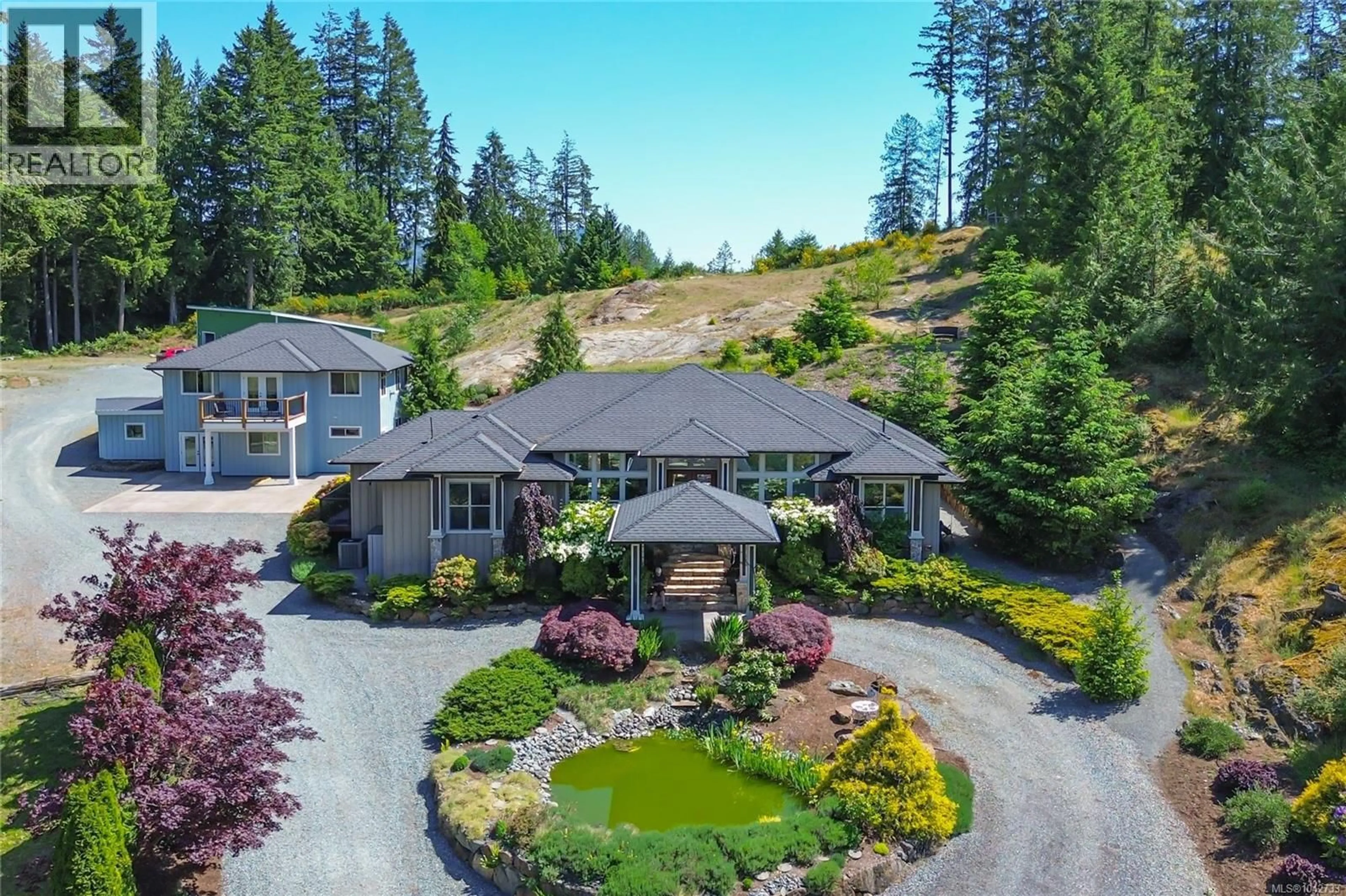 A pic from outside/outdoor area/front of a property/back of a property/a pic from drone, mountain view for 7487 RELKE ROAD, Duncan British Columbia V9L6A7