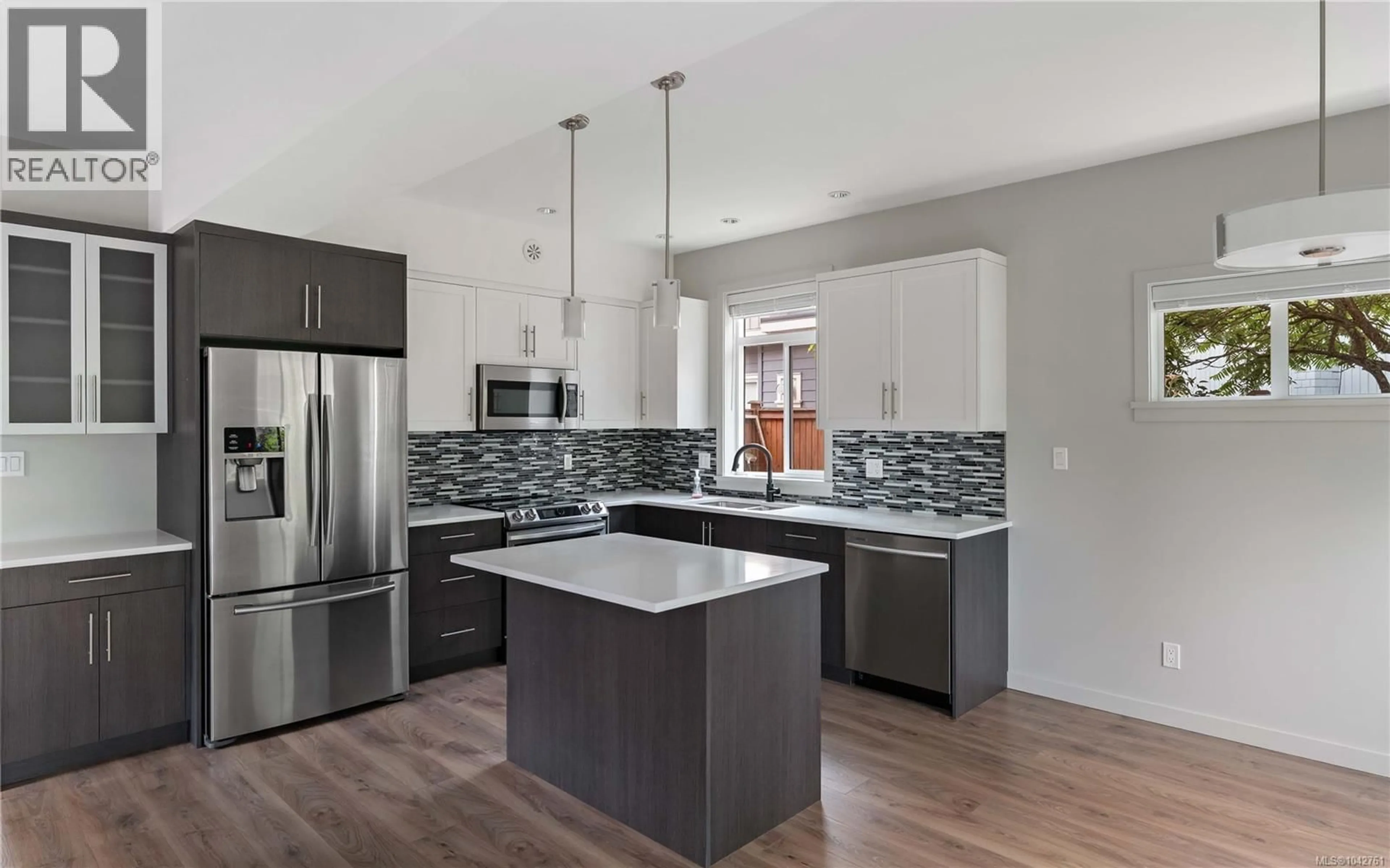 Open concept kitchen, ceramic/tile floor for 7022 WALLACE DRIVE, Central Saanich British Columbia V8M1G1