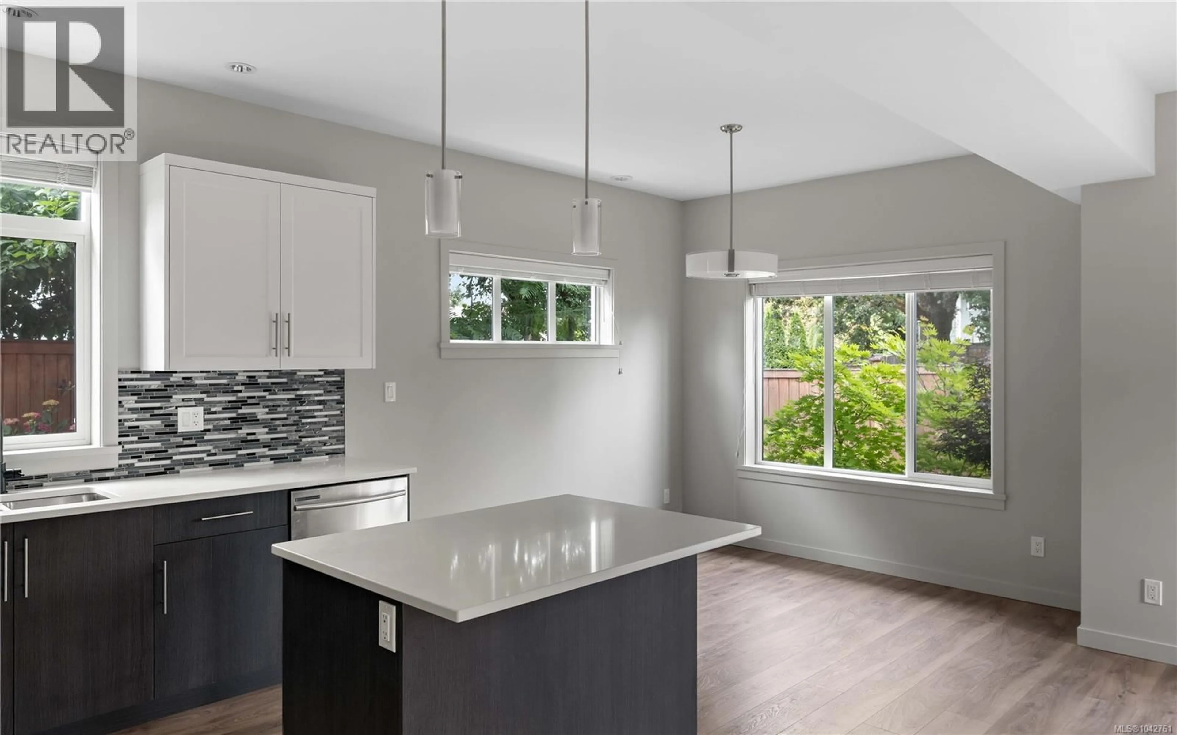 Open concept kitchen, ceramic/tile floor for 7022 WALLACE DRIVE, Central Saanich British Columbia V8M1G1