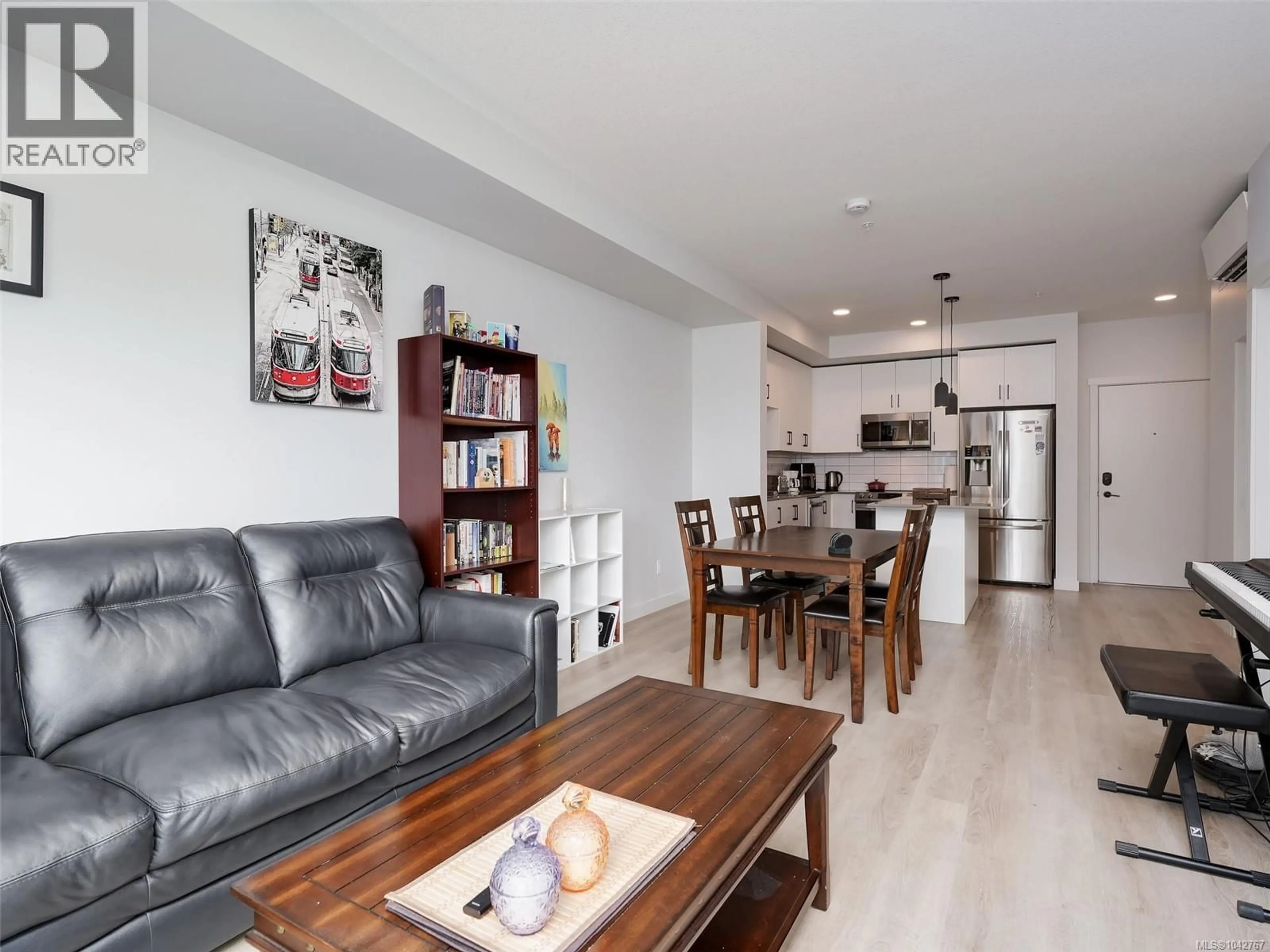 Living room with furniture, wood/laminate floor for 108A - 2461 GATEWAY ROAD, Langford British Columbia V9B6M6